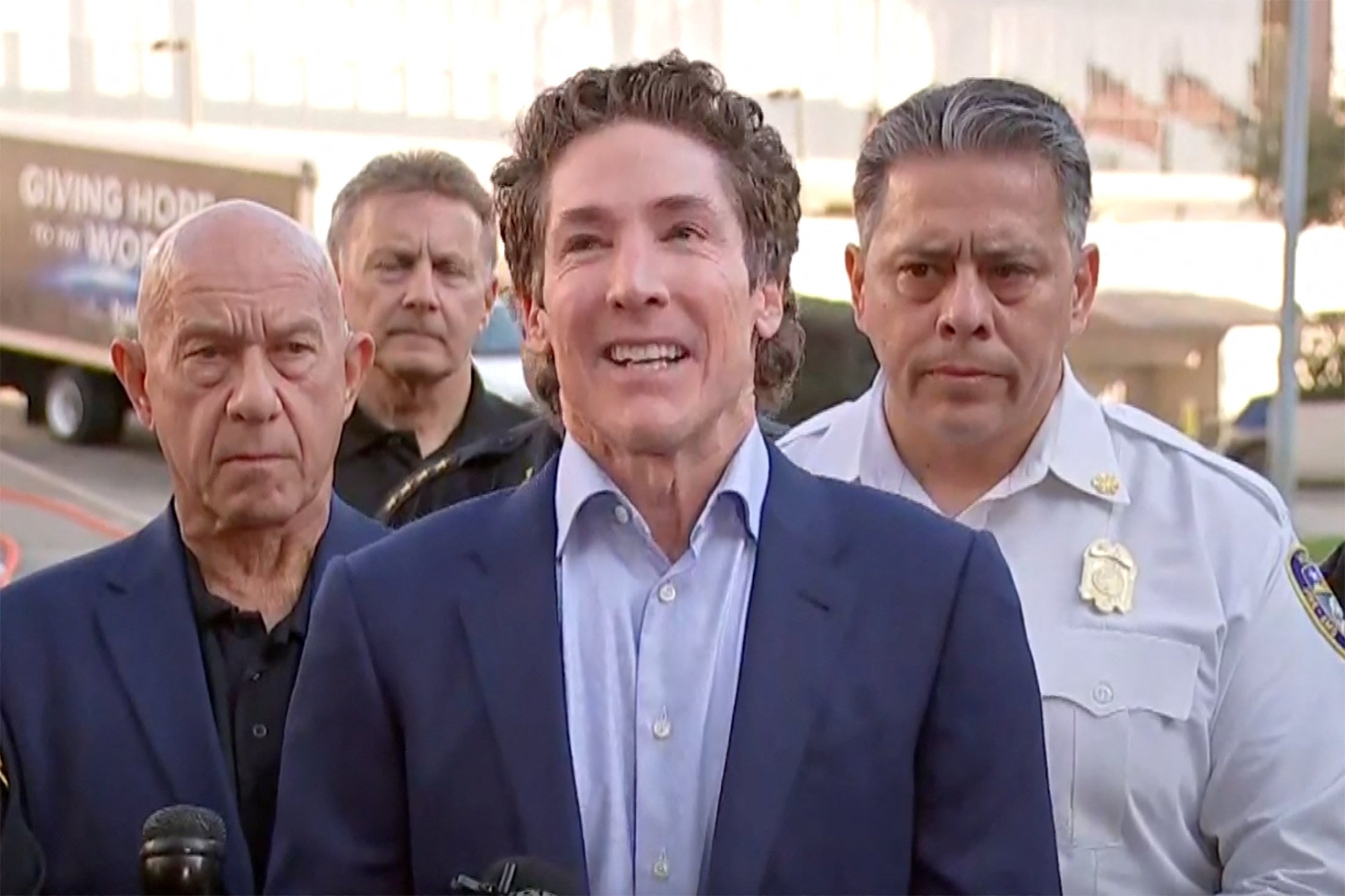 Television evangelist Joel Osteen speaks at a news conference with law enforcement officials at his Lakewood Church