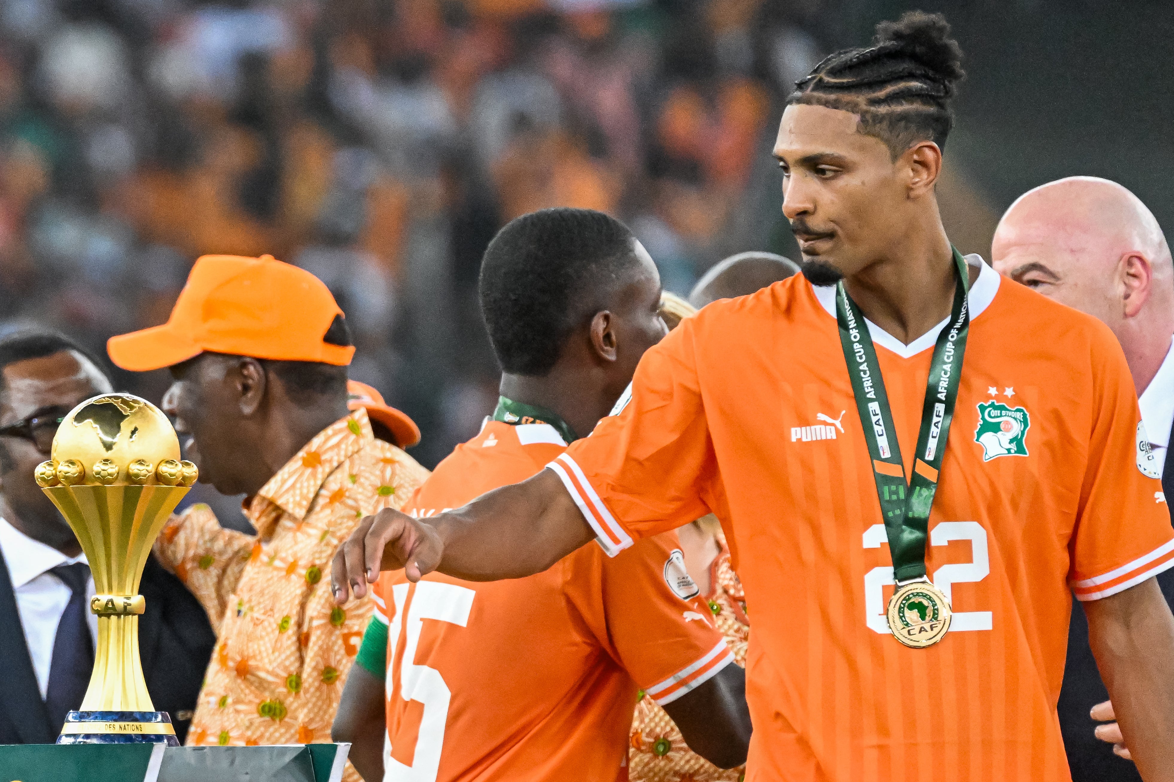 Haller touches the Afcon trophy after scoring in the final