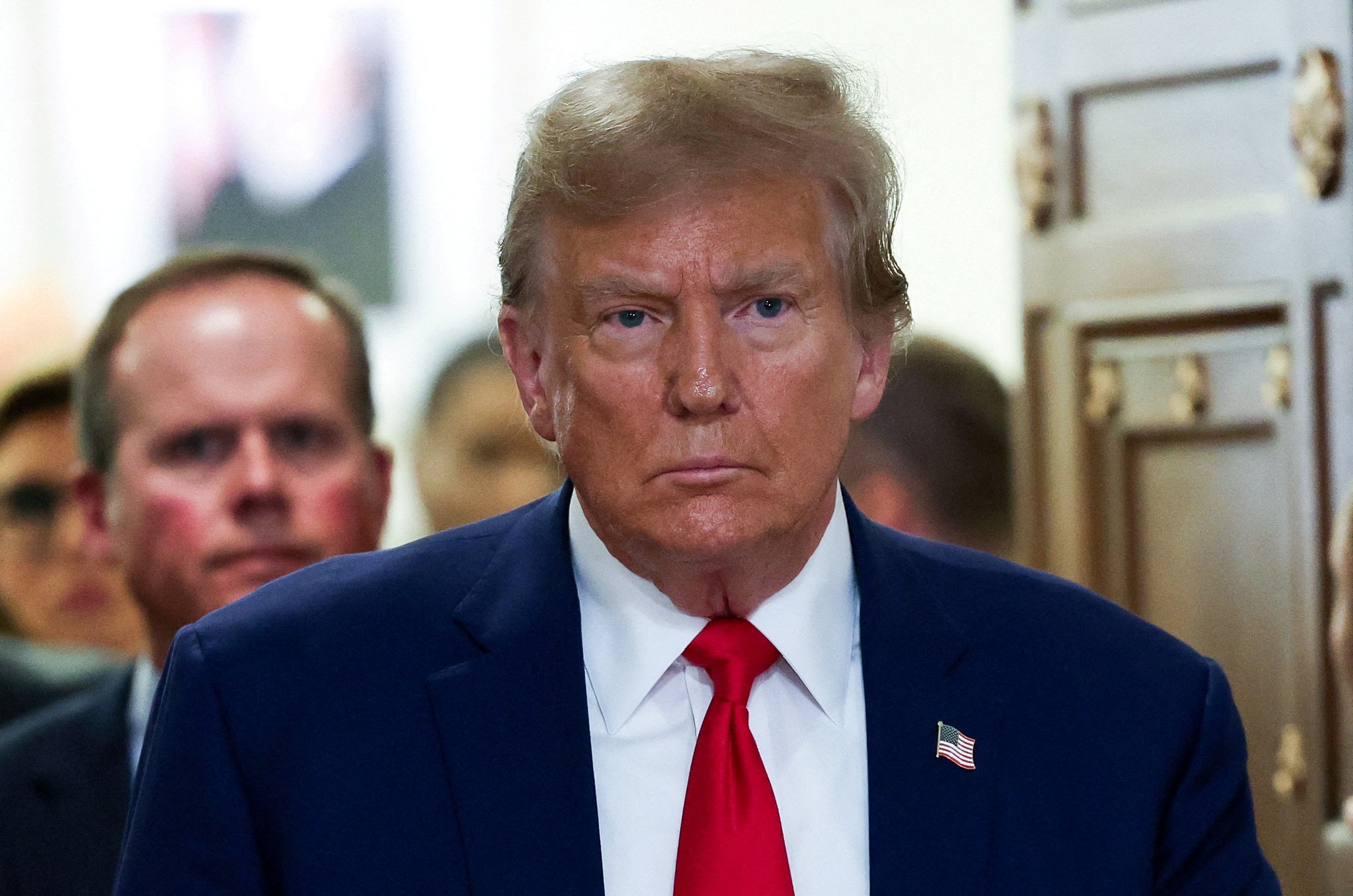 Donald Trump appears at his civil fraud trial in New York City on 11 January