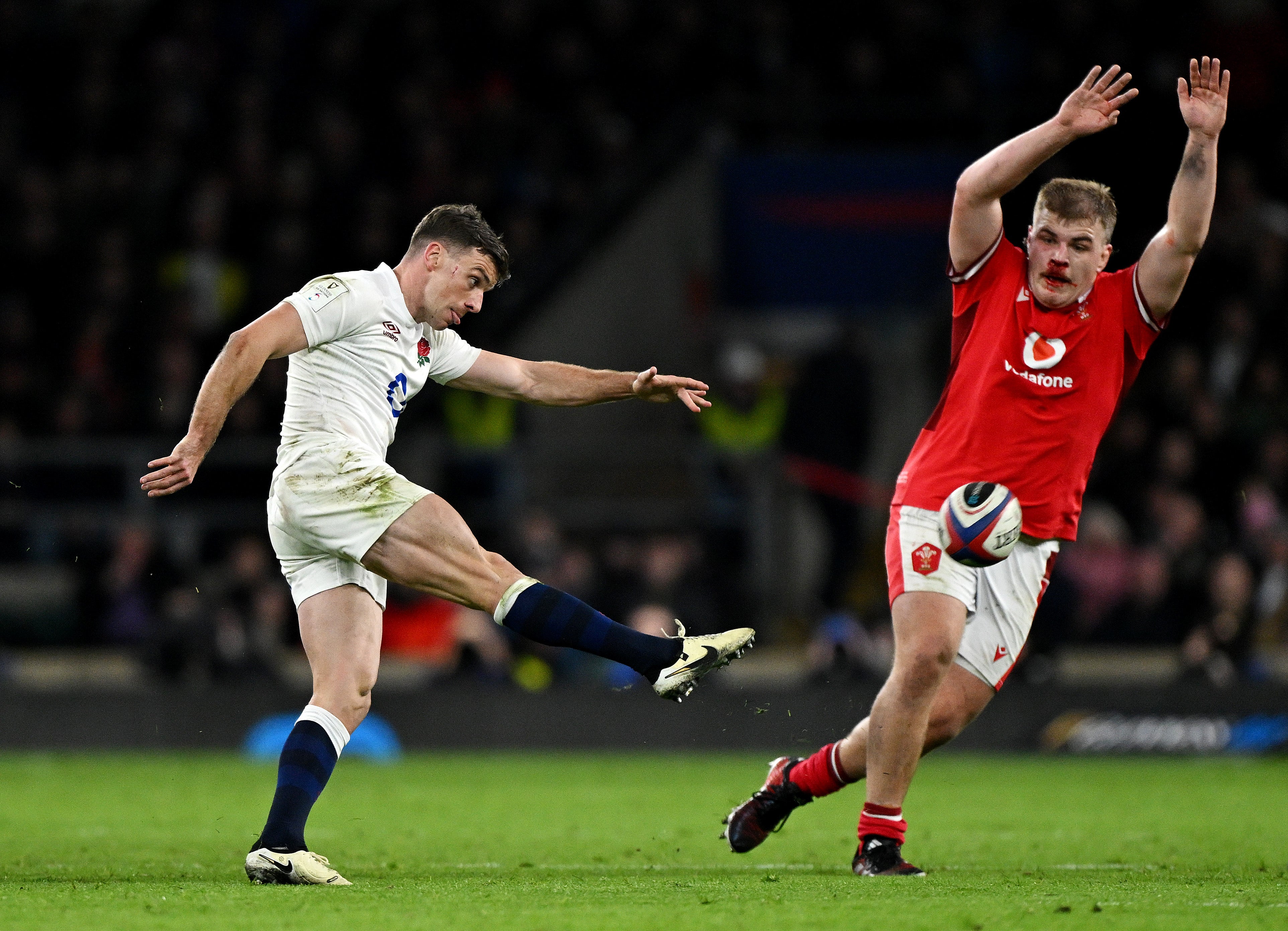 Archie Griffin (right) suffered a knee injury against England