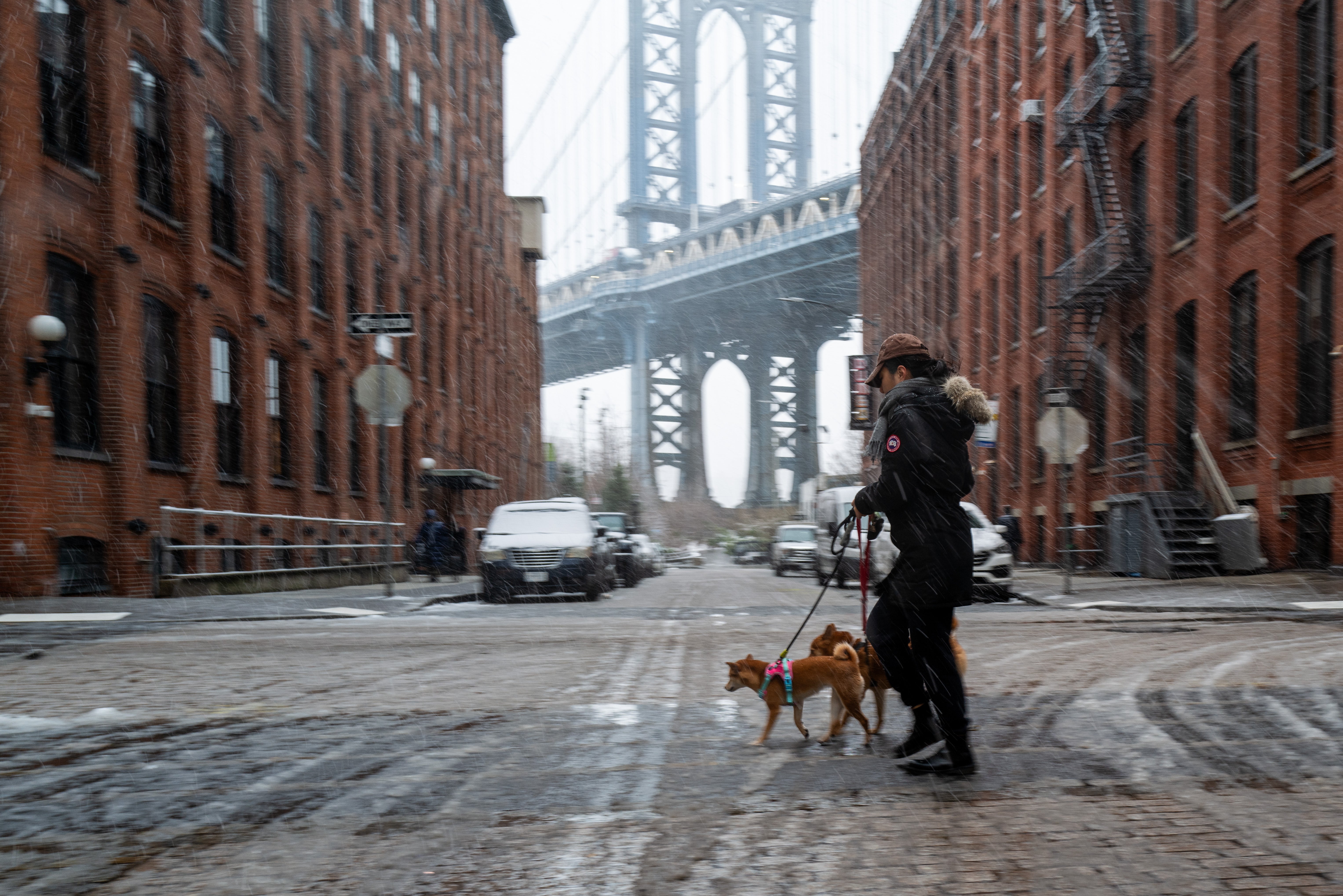 Some tourist spots in New York, like the DUMBO area of Brooklyn in front of the Manhattan Bridge, were quieter than usual