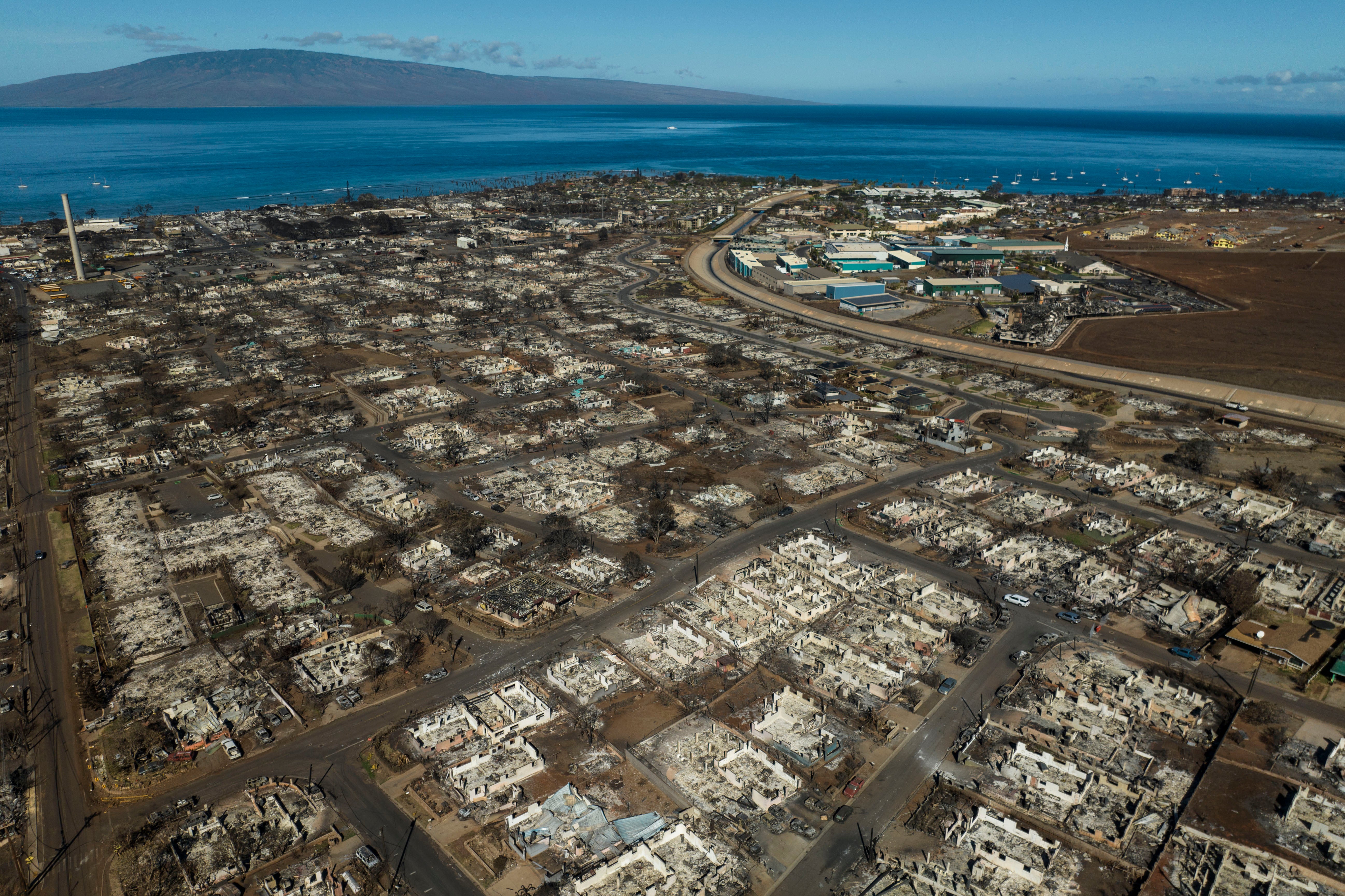 The aftermath of a wildfire is visible in Lahaina, Hawaii, 17 August 2023