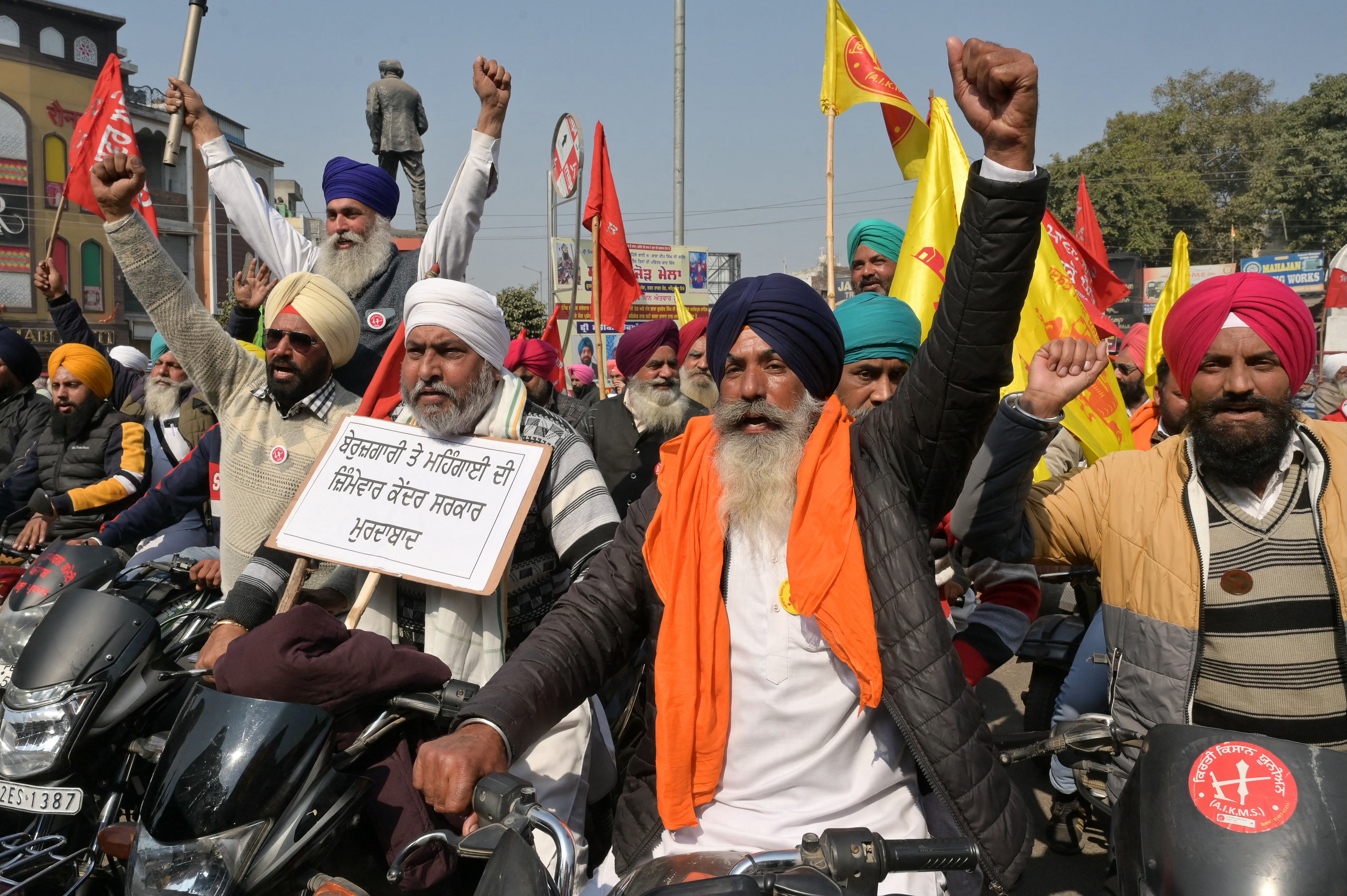 Farmers shout slogans during a demonstration against central government over their various demands in Amritsar