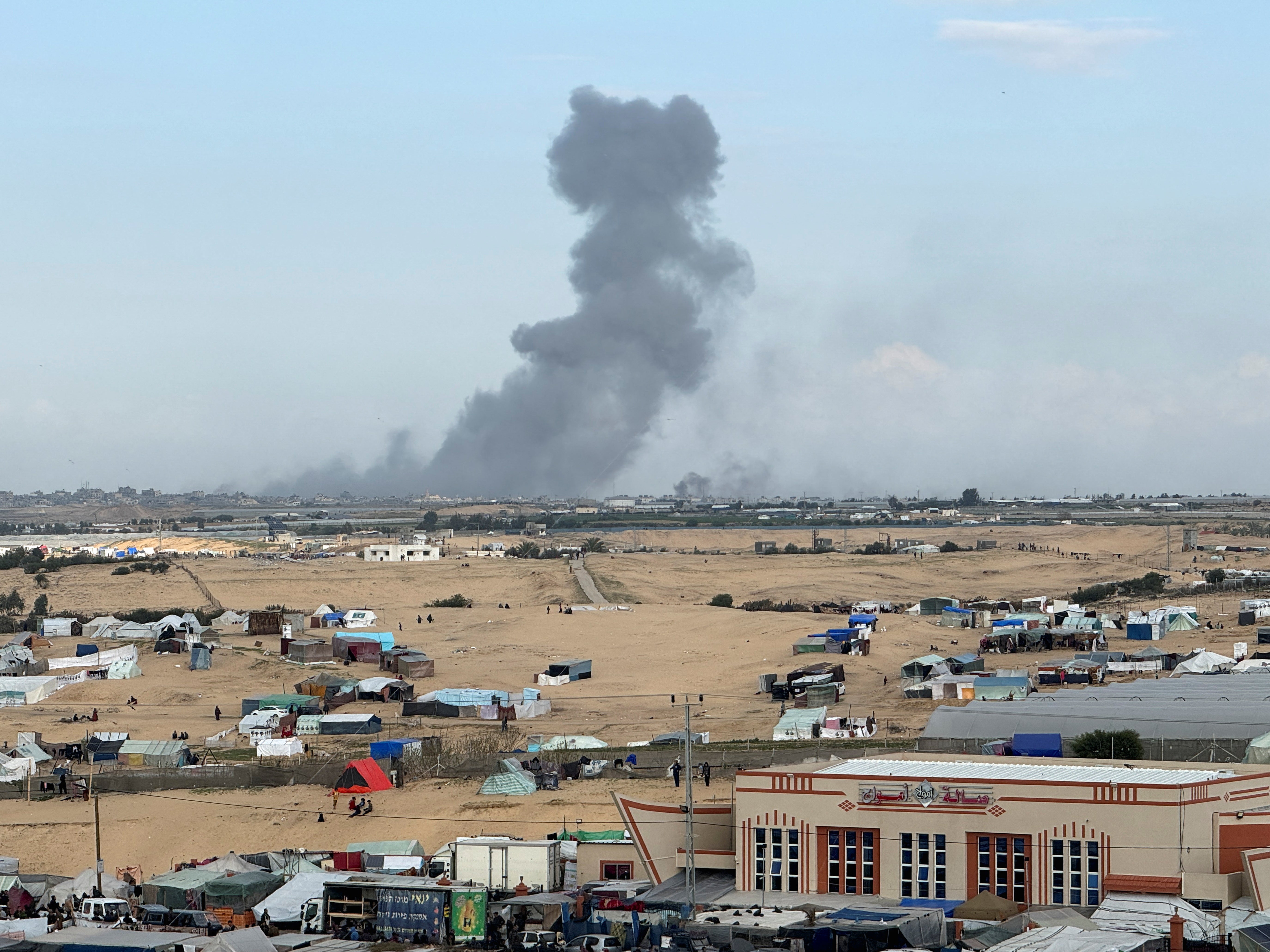 Smoke rises during an Israeli ground operation in Khan Younis