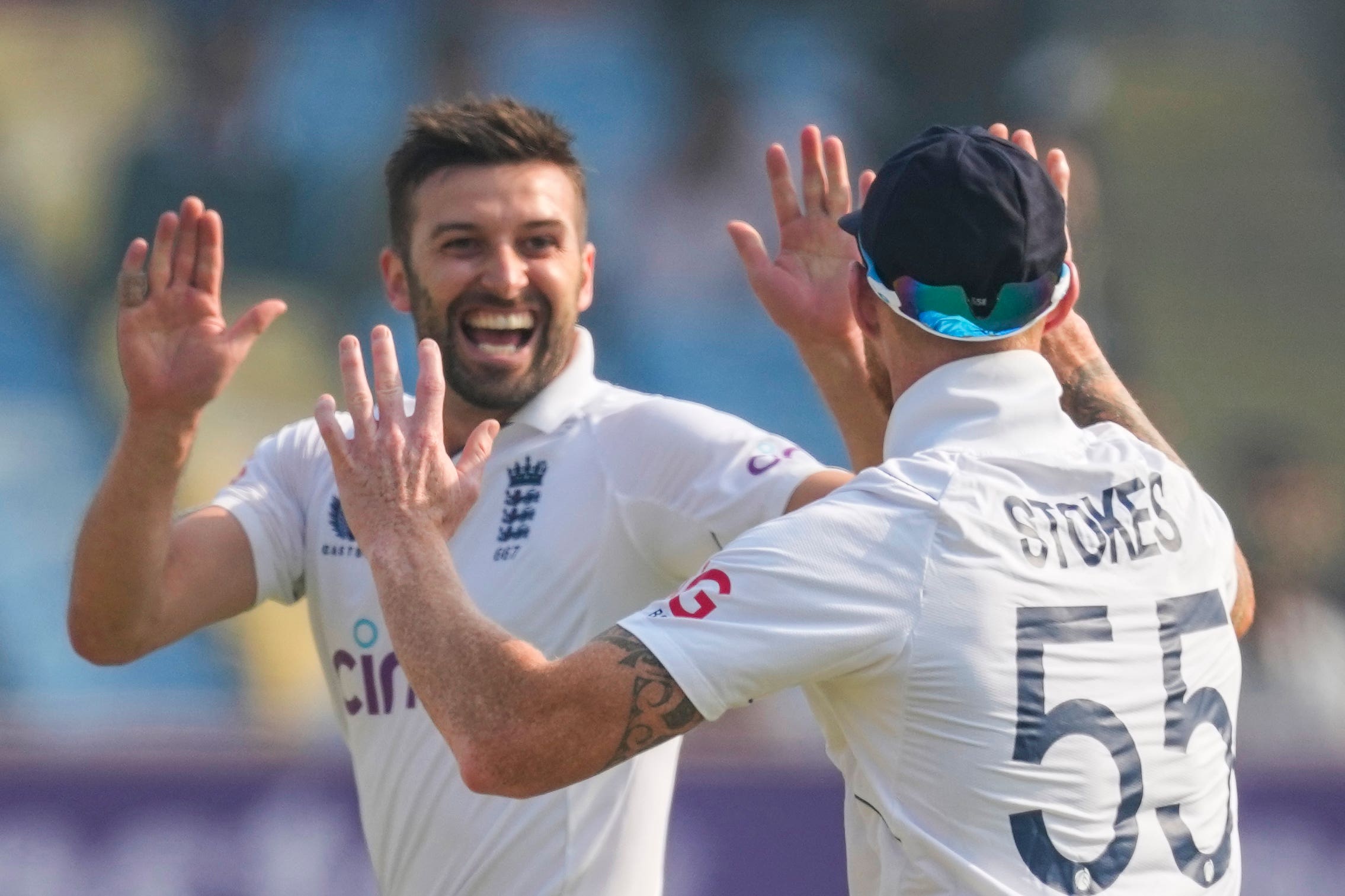 Mark Wood (left) celebrated the wicket of Shubman Gill (Ajit Solanki/AP)