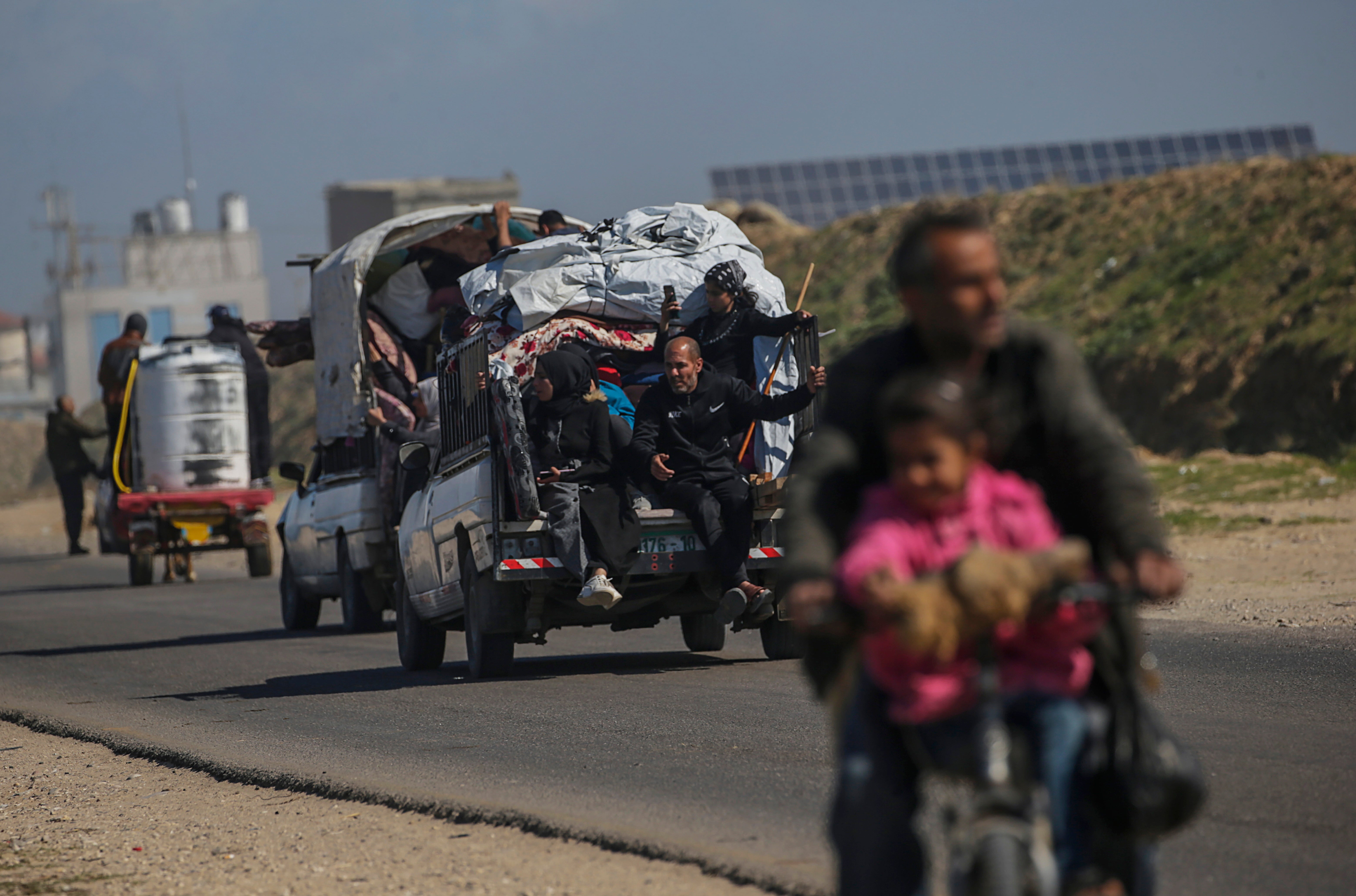 Residents evacuate from Rafah in the southern Gaza Strip, 14 February 2024