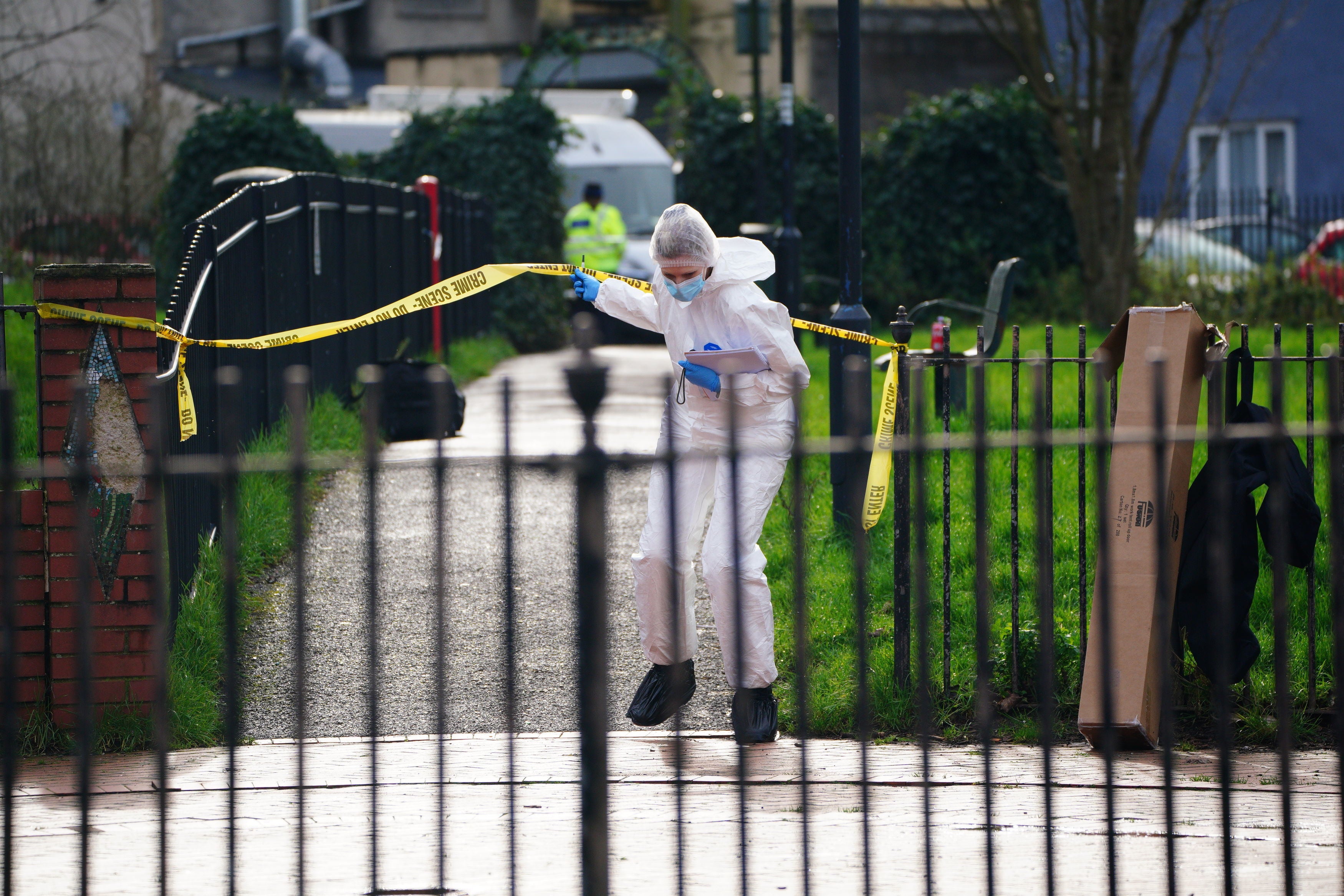 Police and forensic officers at Rawnsley Park near to the scene in the St Philips area of Bristol where a 16-year-old boy has died after being stabbed on Wednesday evening