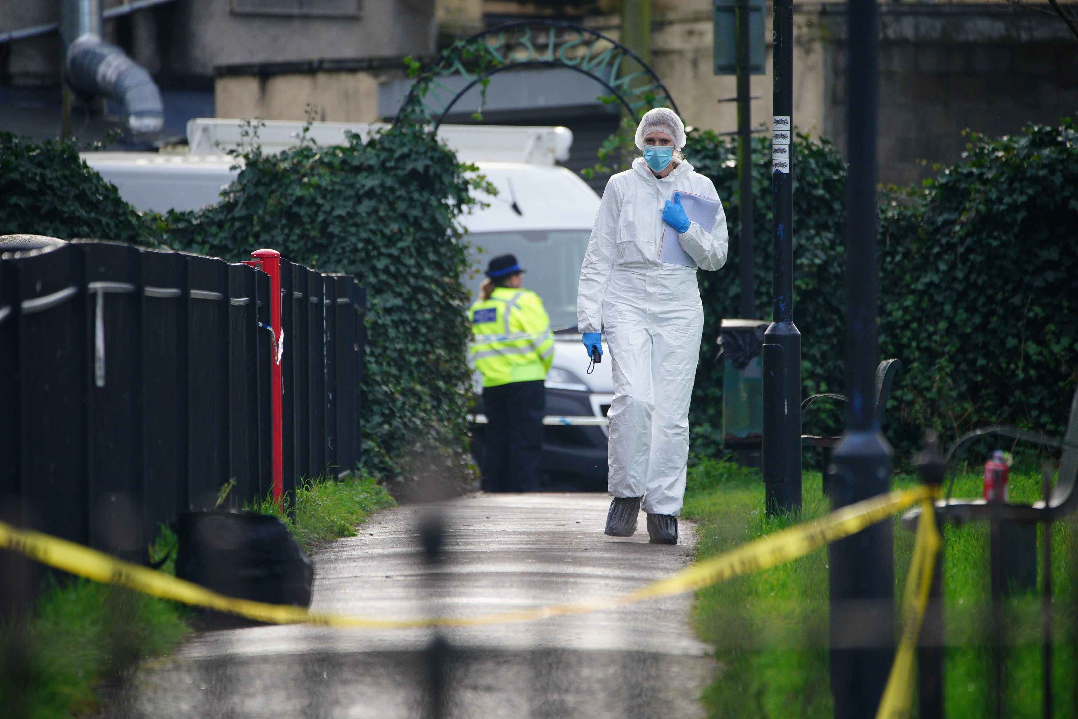 Police and forensic officers at Rawnsley Park near to the scene in the St Philips area of Bristol where a 16-year-old boy has died after being stabbed on Wednesday evening