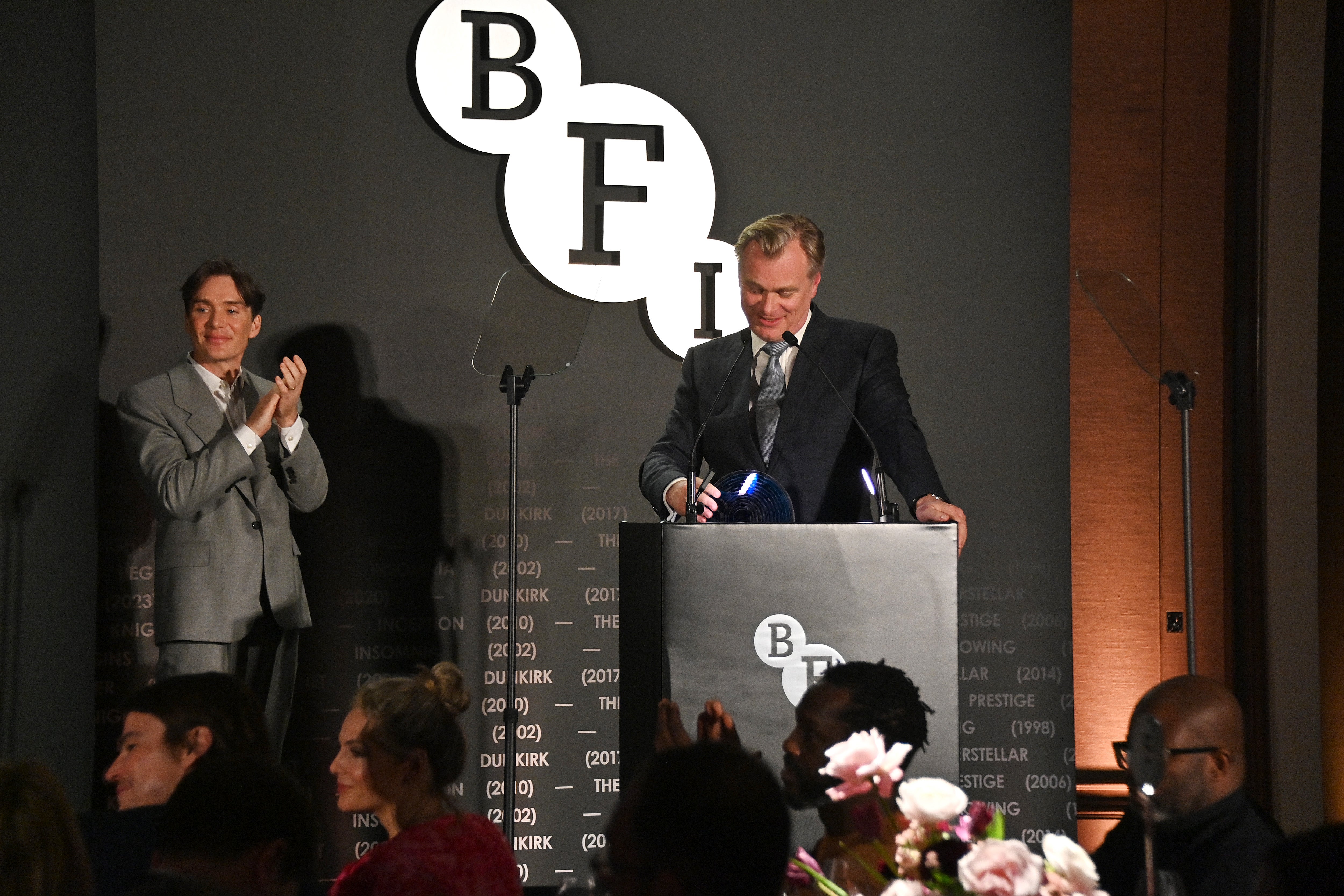 Irish Actor Cillian Murphy presenting film director Christopher Nolan with the BFI Fellowship Award