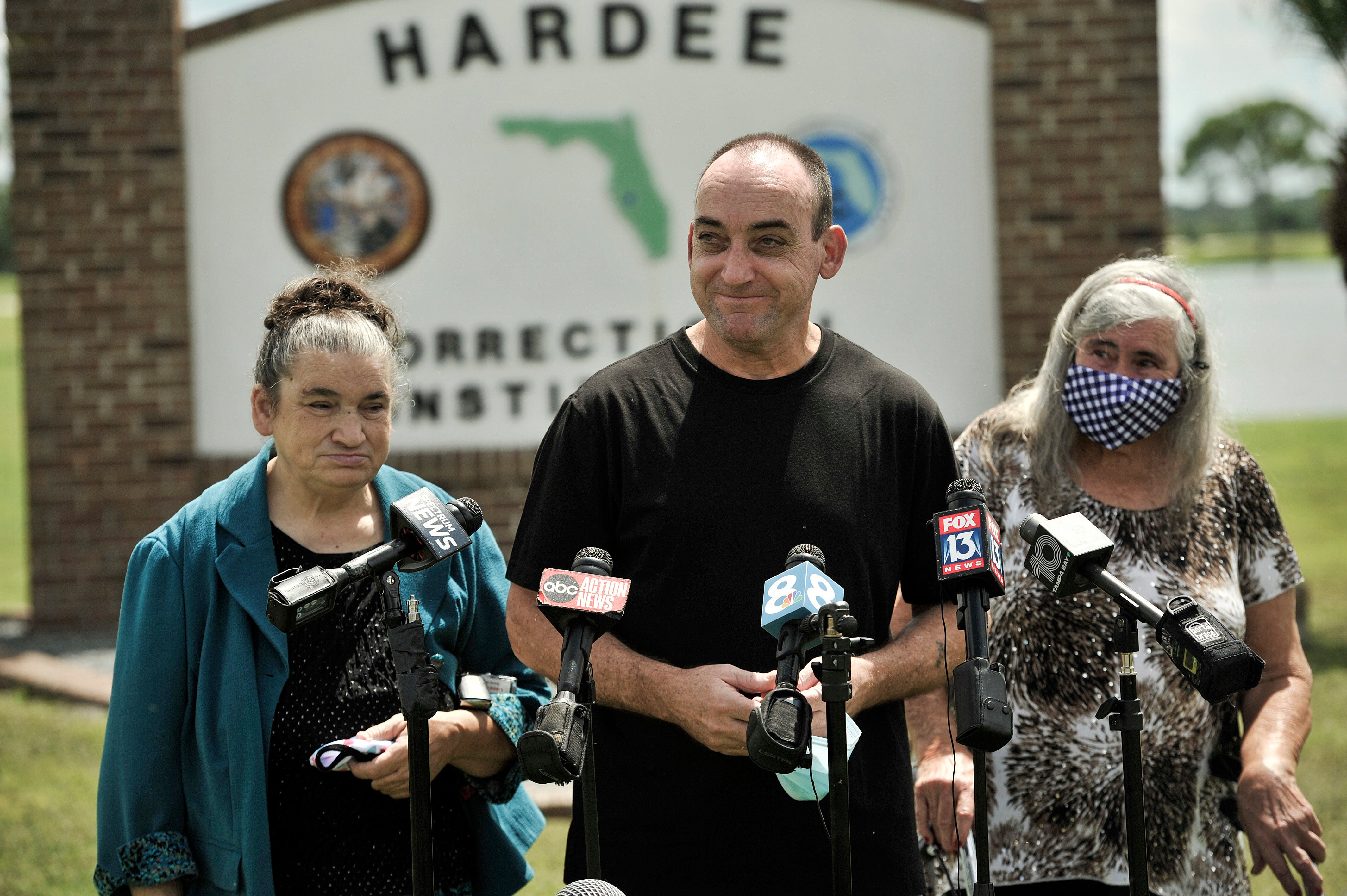 Former inmate Robert DuBoise, 56, meets reporters with his sister Harriet