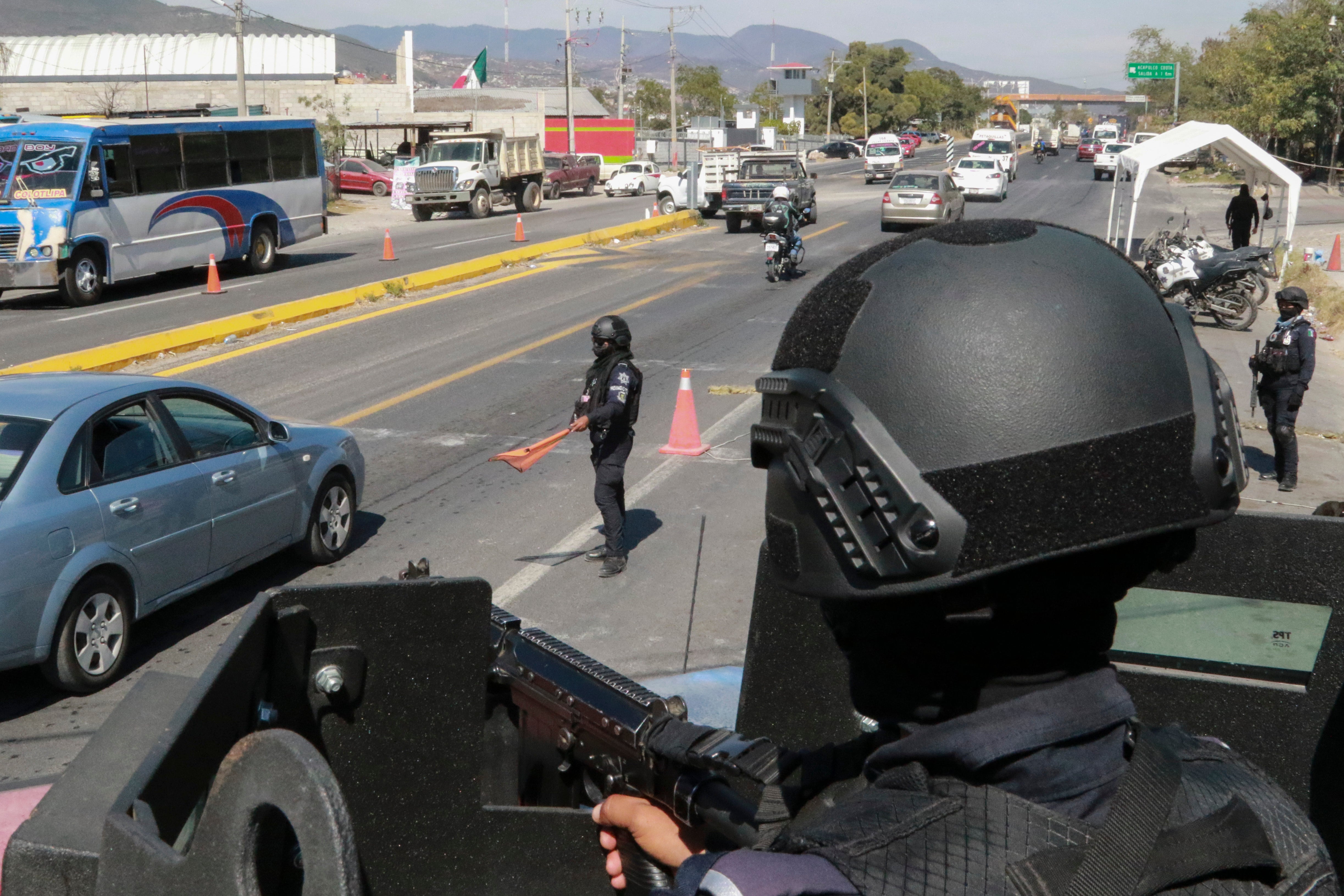 State police maintain a security checkpoint at the entrance of Chilpancingo, Mexico