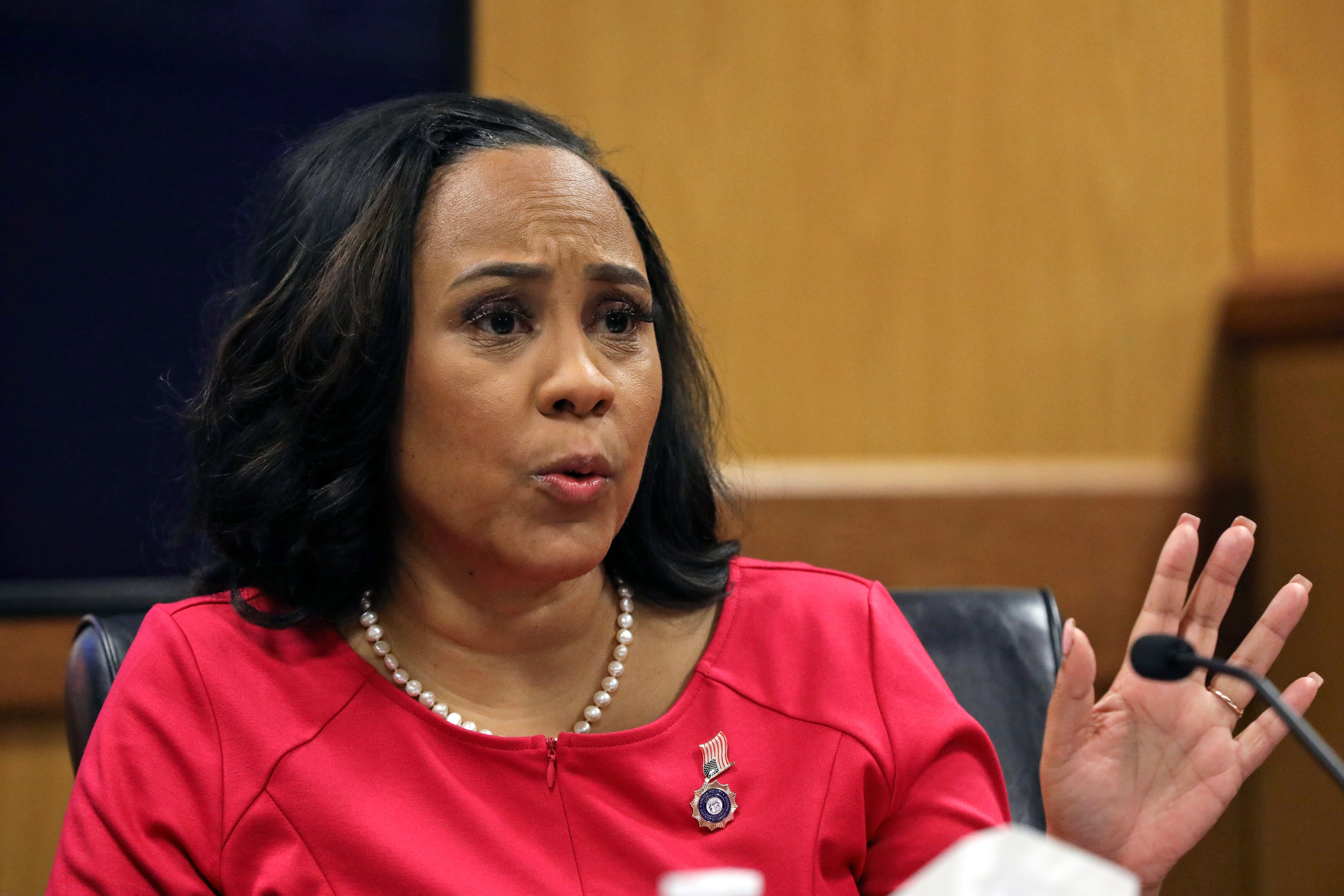 Fulton County District Attorney Fani Willis testifies during a hearing on the Georgia election interference case