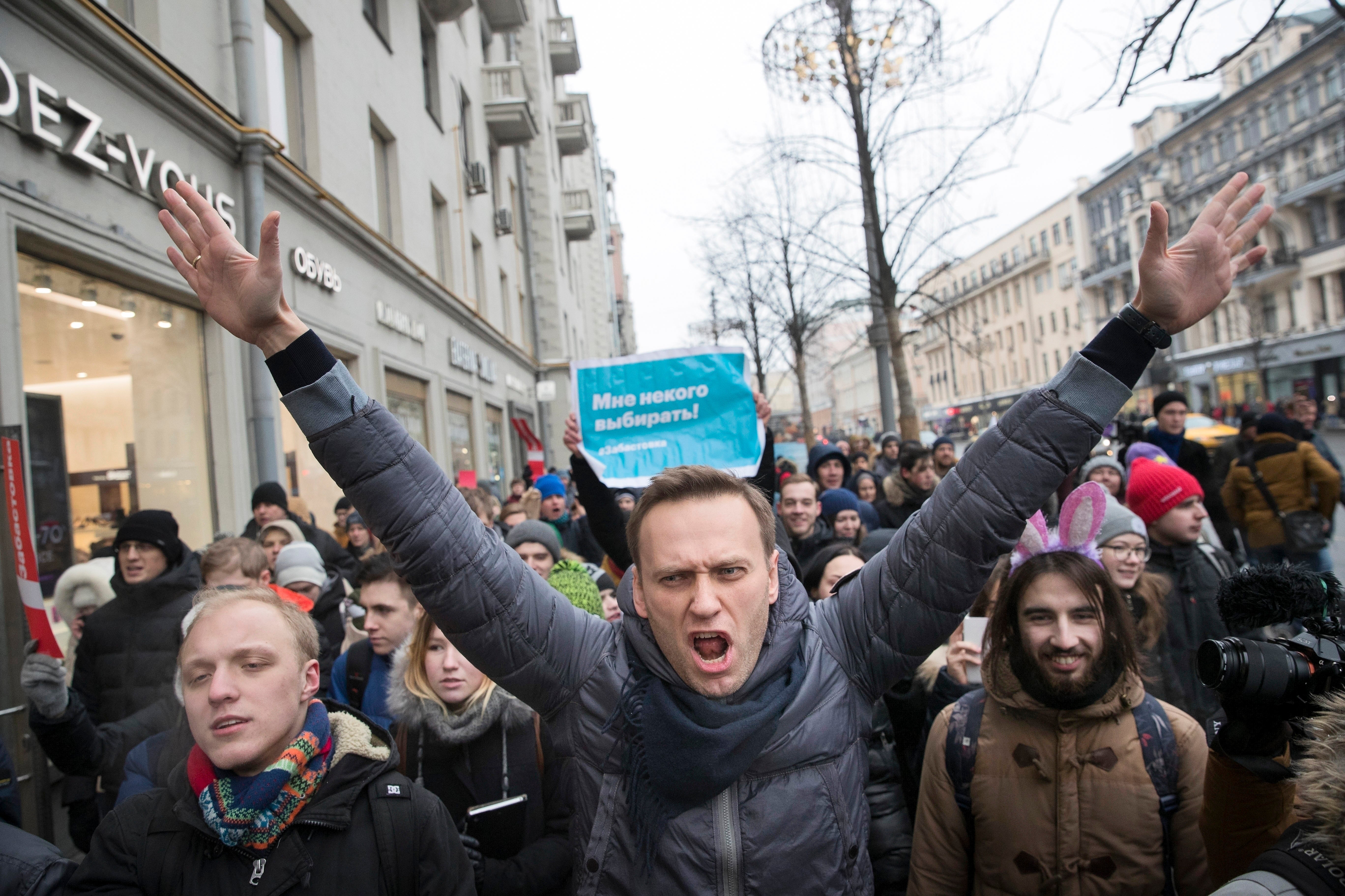 Navalny, centre, attending a rally in Moscow in 2018