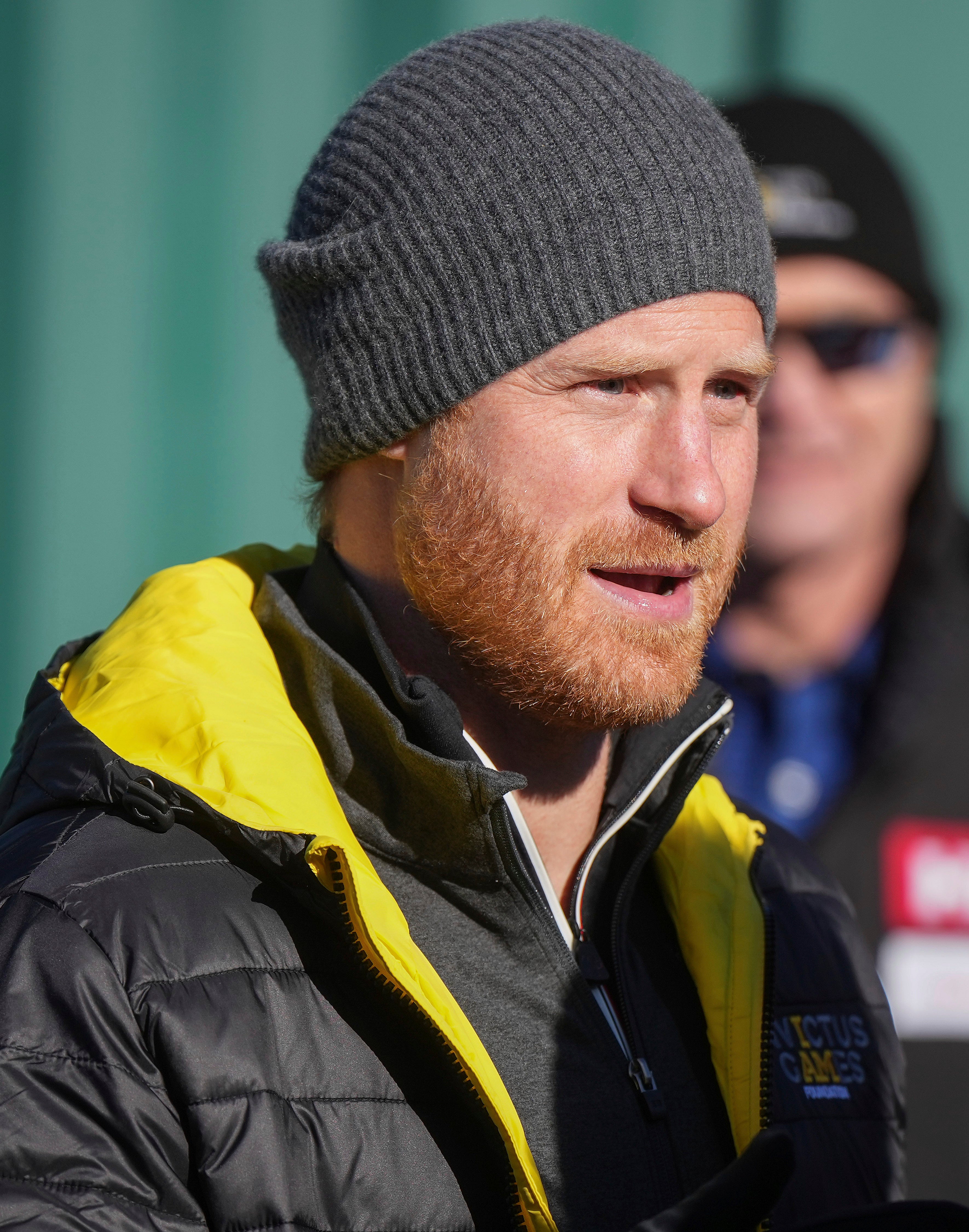 Prince Harry, the Duke of Sussex, talks with skeleton athletes during an Invictus Games training camp