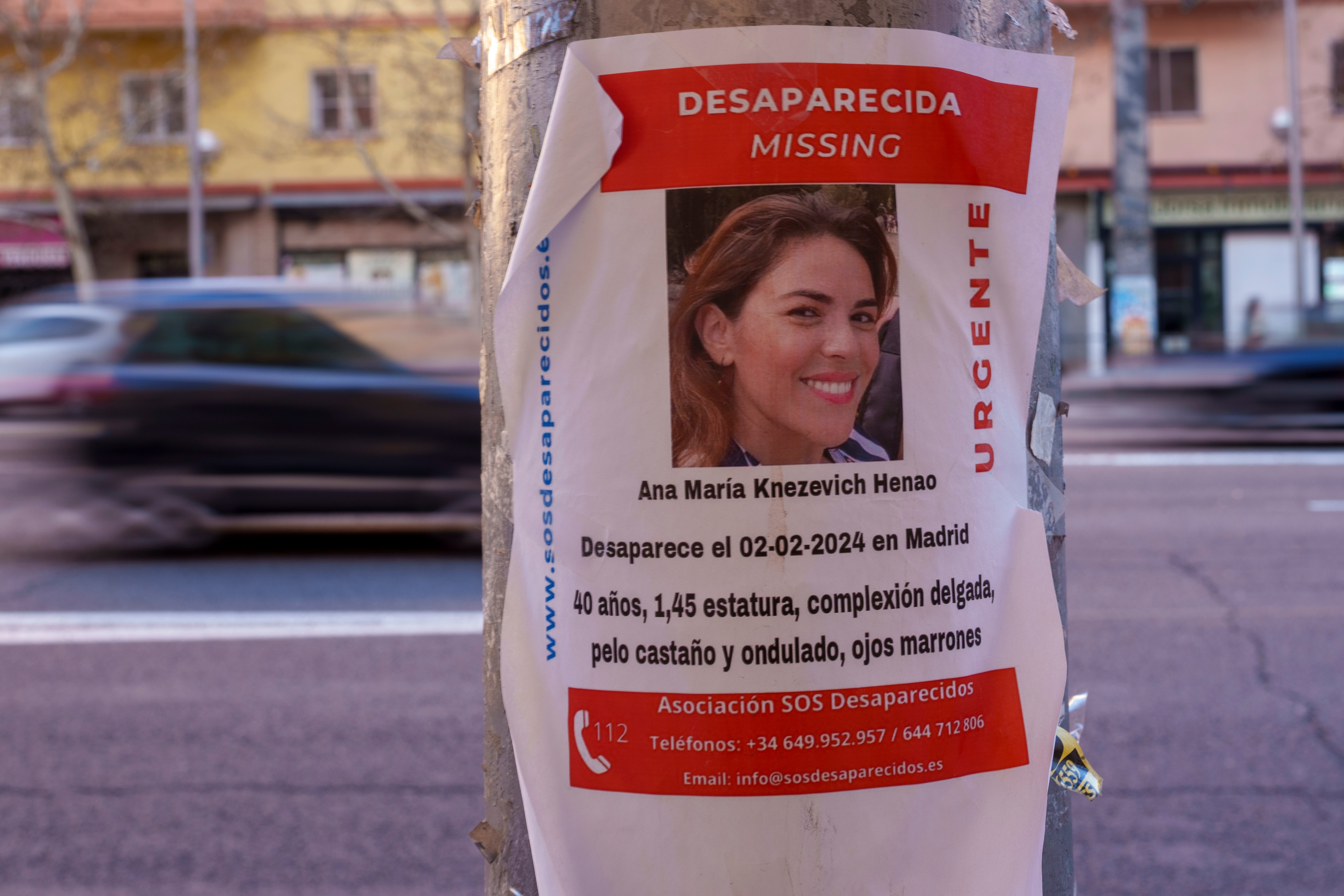 A banner of a Colombian-born American missing woman Ana Maria Knezevich Henao, 40, is displayed on a streetlight in Madrid