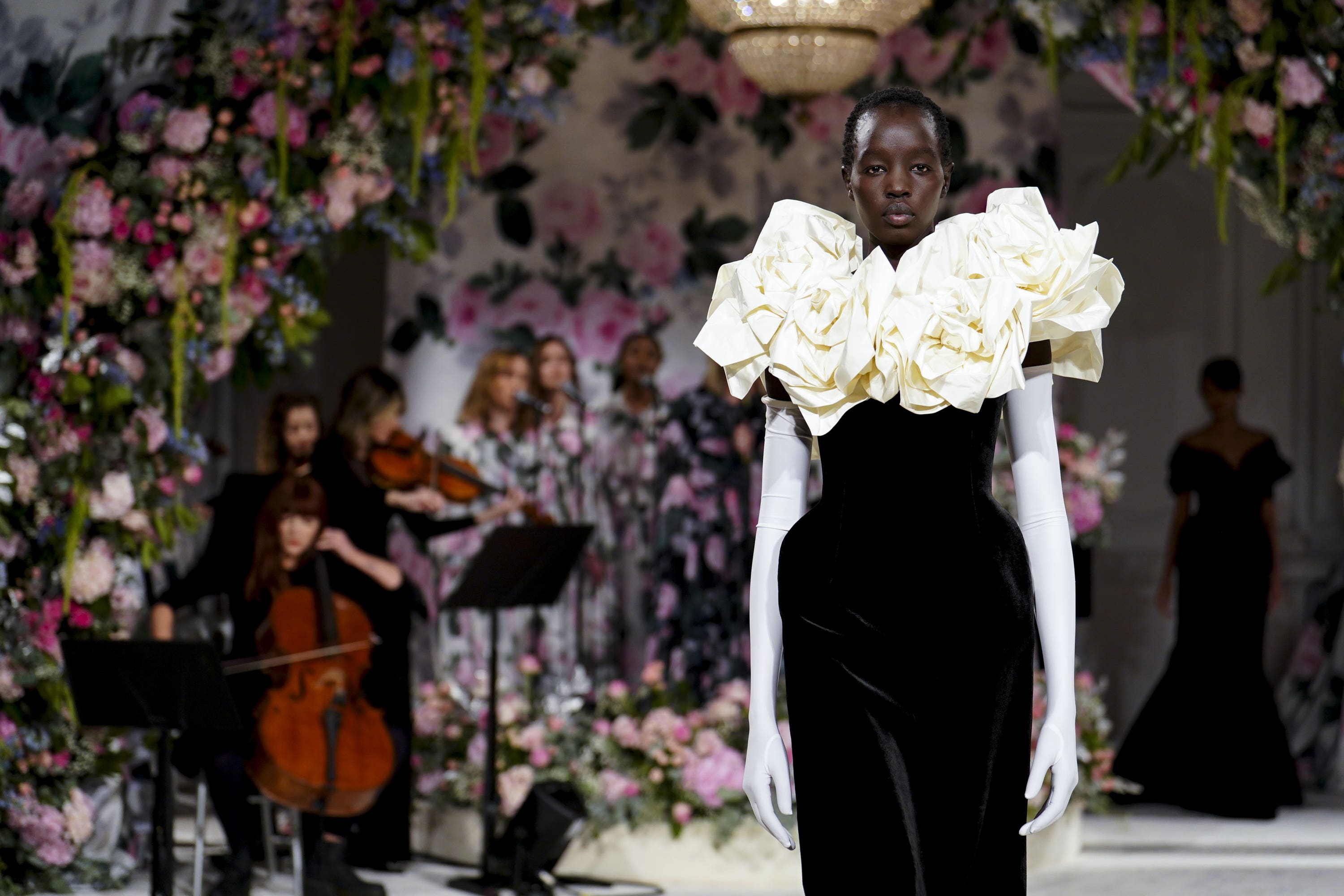 Models on the catwalk during the Richard Quinn show in the 1901 Ballroom at the Andaz Hotel, London, during London Fashion Week 2024 (Jordan Pettitt/PA)