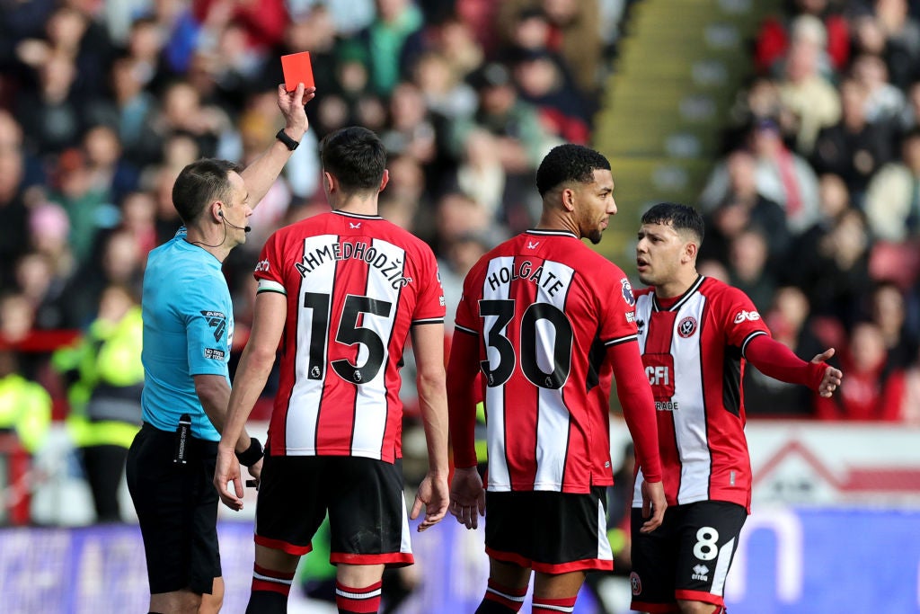 Holgate was sent off for a knee-high challenge on Kaoru Mitoma