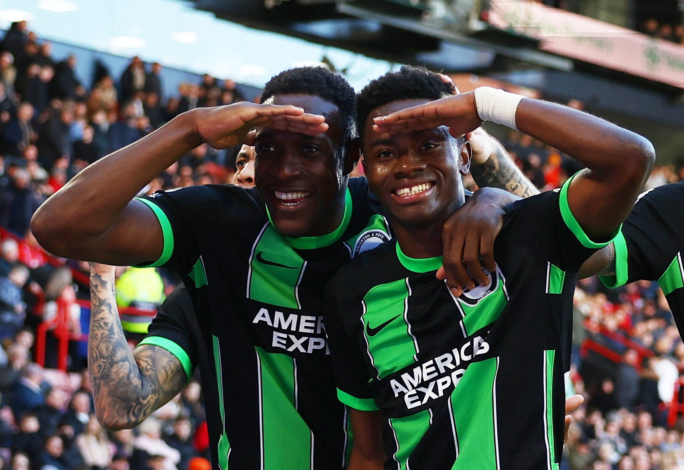 Adingra (right, with Danny Welbeck) scored a late double