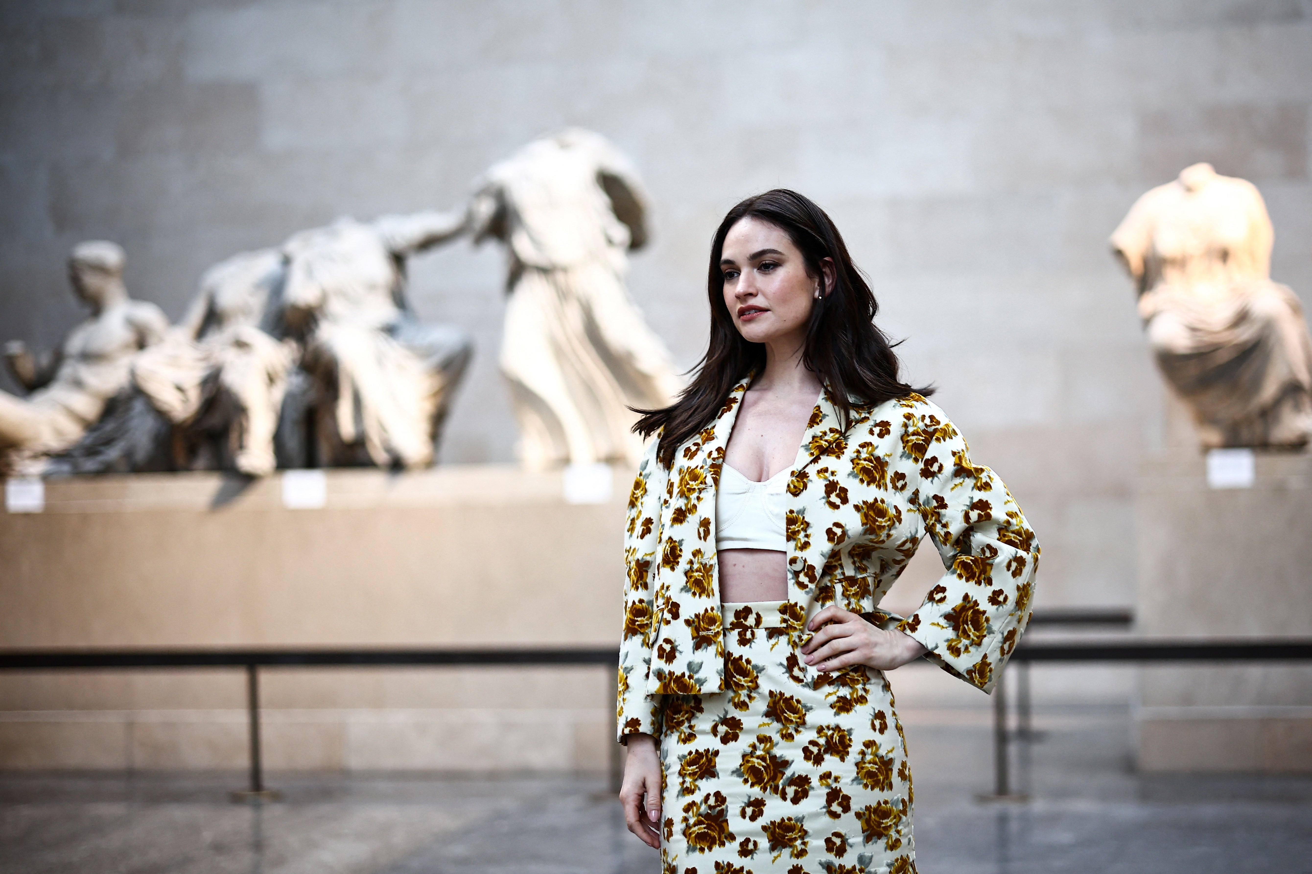 Lily James was pictured posing in front of the artefacts