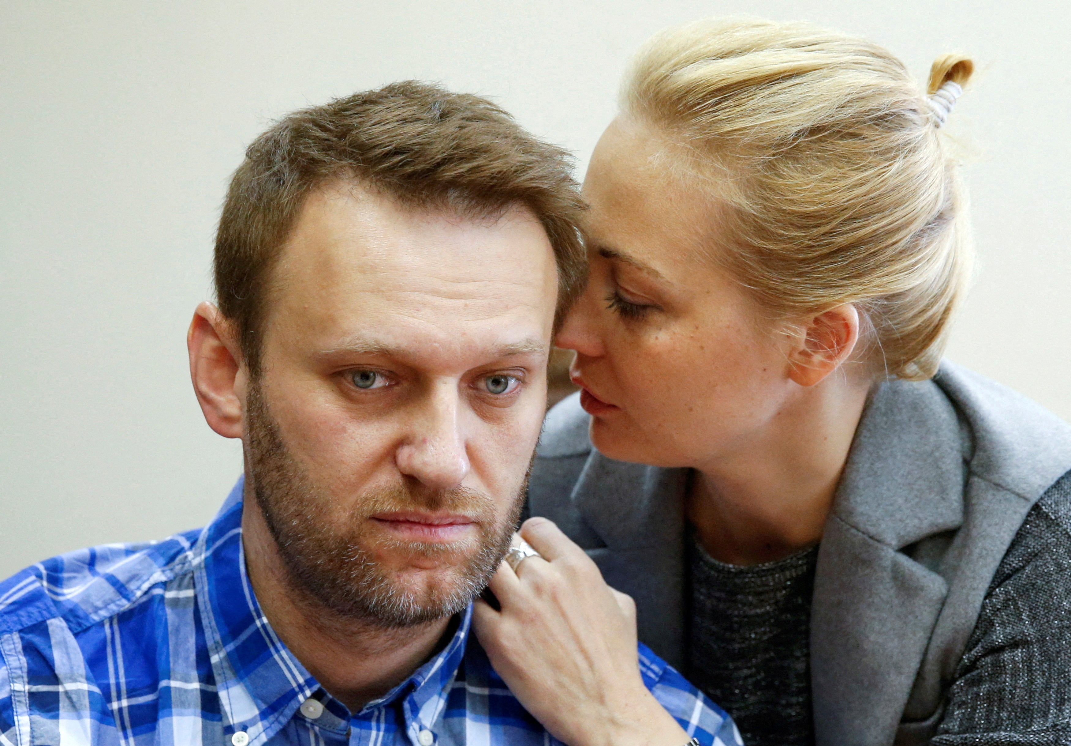 Russian opposition leader Alexei Navalny and his wife Yulia attend a hearing at the Lublinsky district court in Moscow, Russia, 23 April 2015