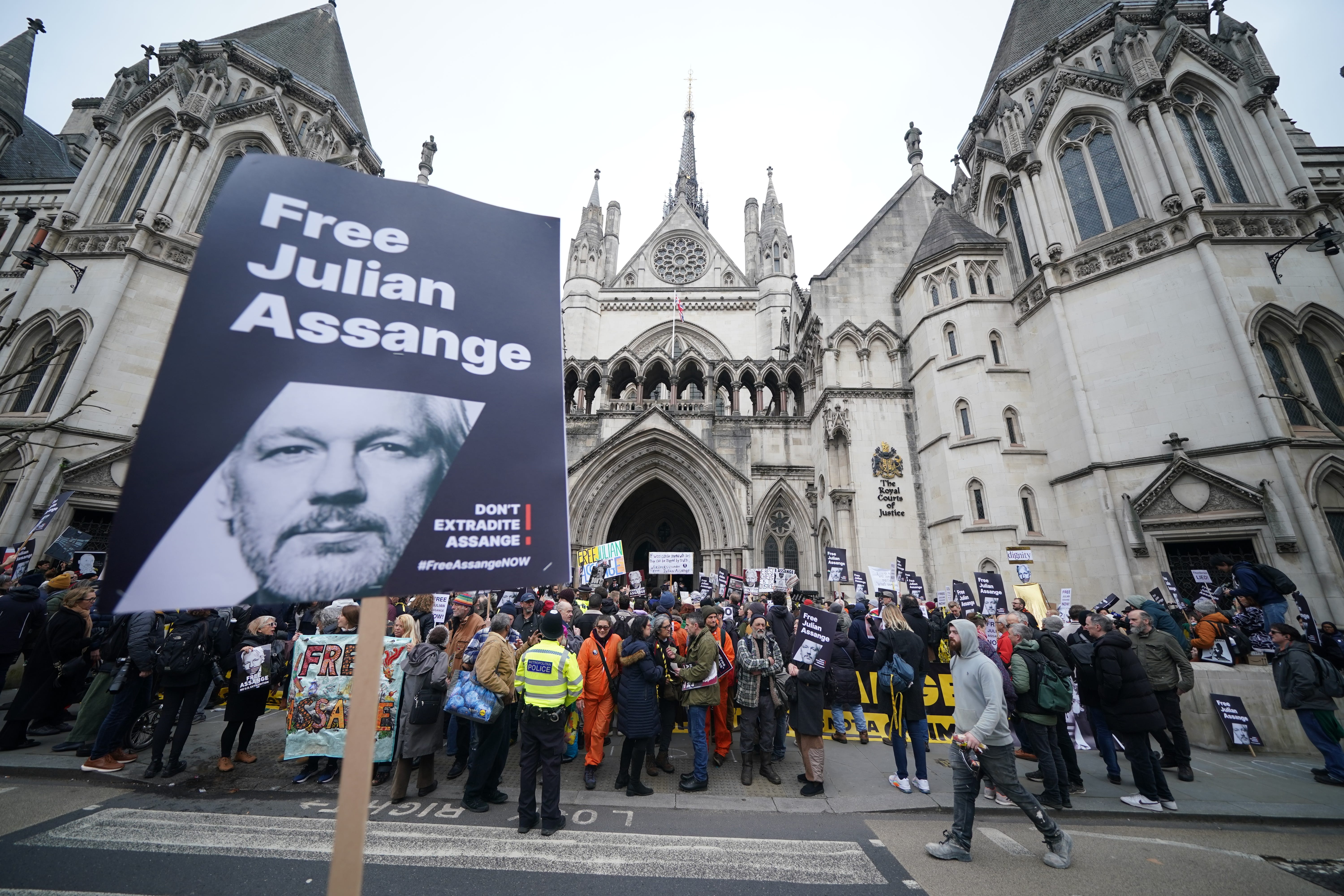 Supporters gathered outside the Royal Courts Of Justice in London, ahead of a two-day hearing in the extradition case of WikiLeaks founder Julian Assange (PA)