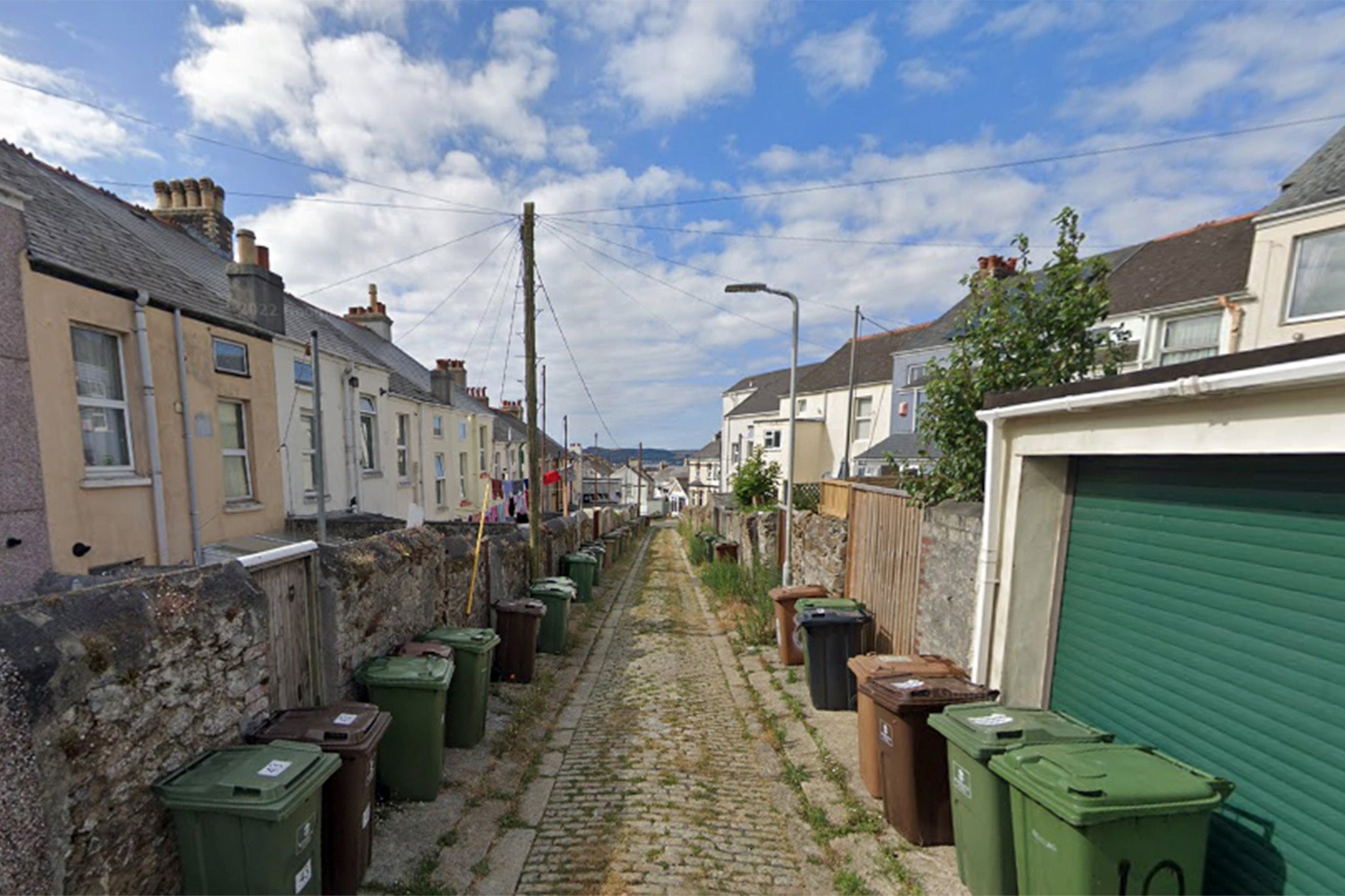 A police cordon was in place over this alley and other parts of St Michael Avenue