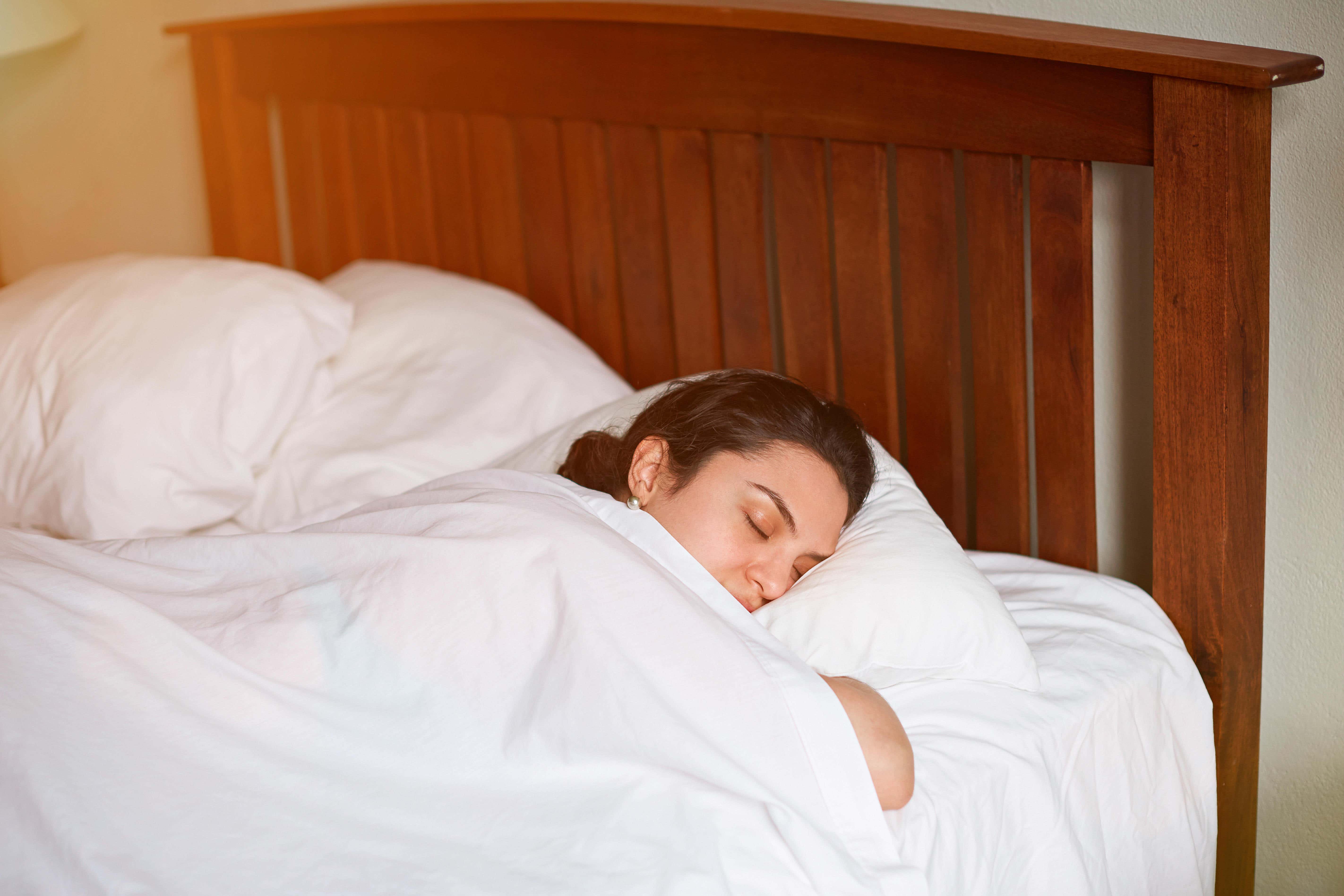 A new study has found that getting plenty of sleep can stave off IBS (Alamy/PA)