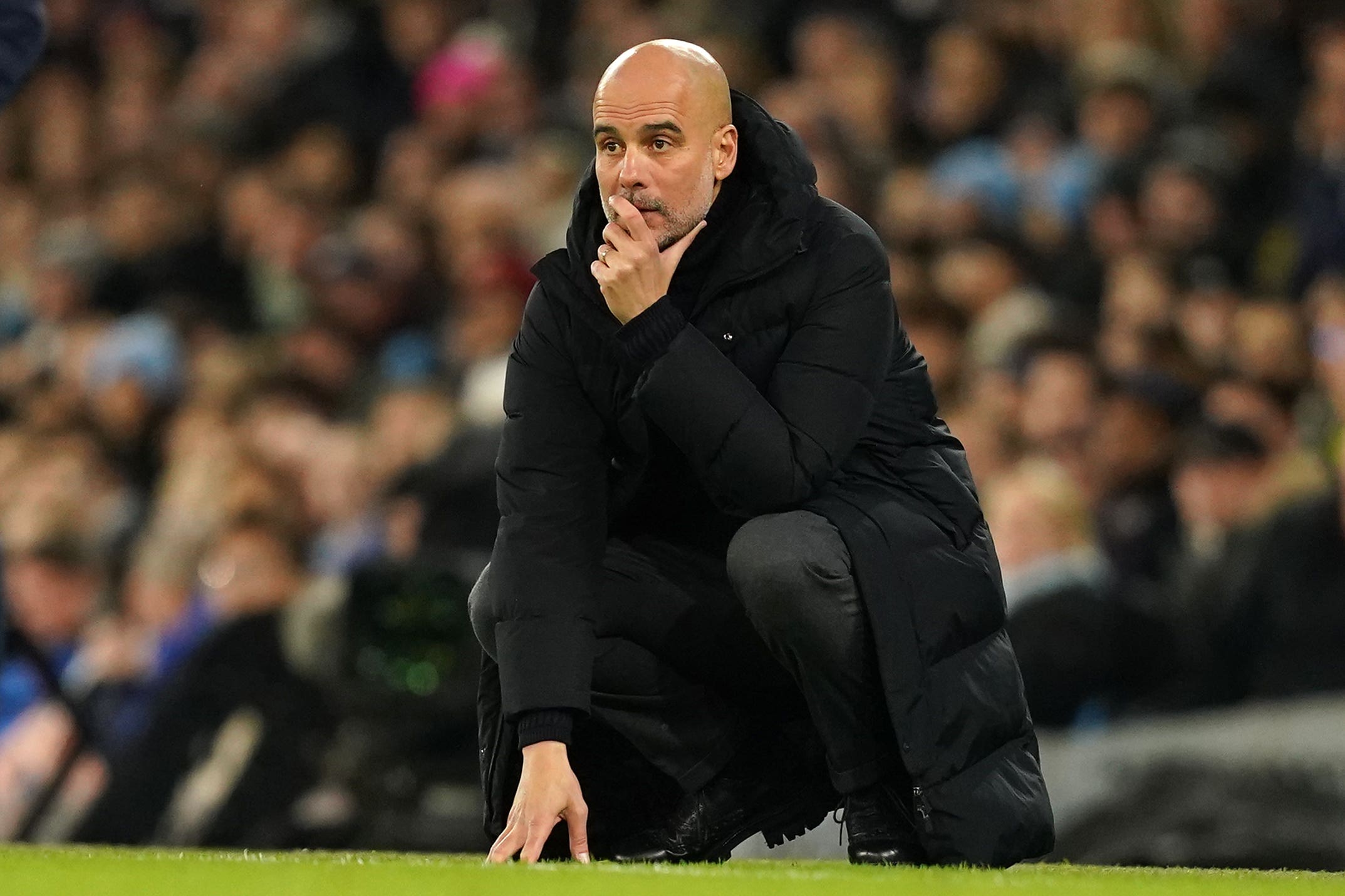 Pep Guardiola endured a tense evening before Manchester City found the breakthrough (Martin Rickett/PA)