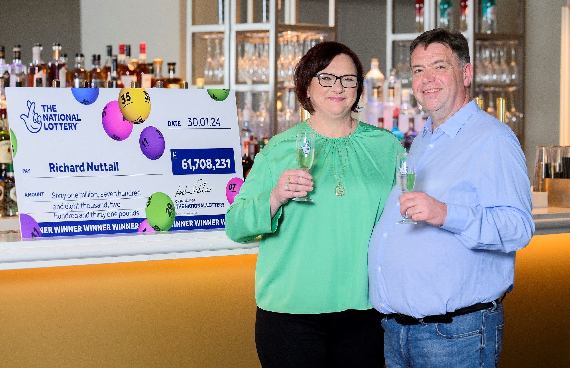 Handout photo issued by the National Lottery operator Allwyn of EuroMillions winners Richard and Debbie Nuttall, both 54, from Colne, Lancashire, after they won a £61,708,231 share of the £123 million