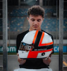 Lando Norris pays tribute to ‘dear friend’ Gil de Ferran with signature helmet at F1 testing