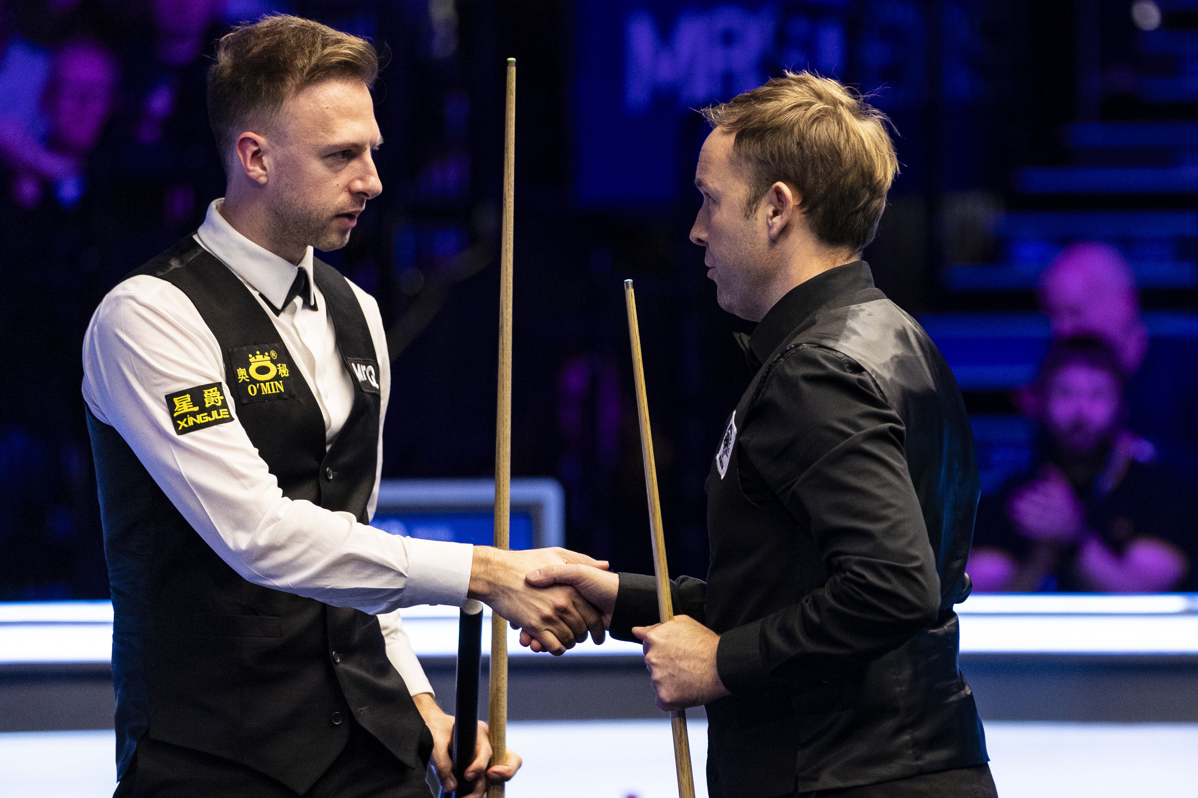 Ali Carter, right, booked his place in the Players Championship semi-final with victory over Judd Trump (Steven Paston/PA)