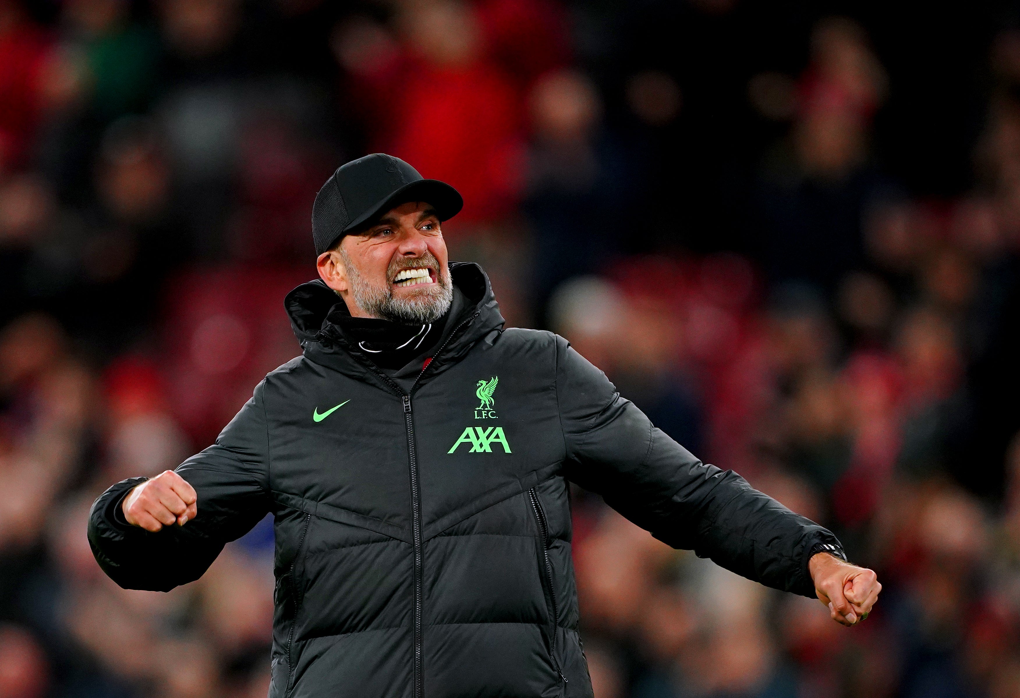 Jurgen Klopp celebrates in front of the Kop after Liverpool beat Luton