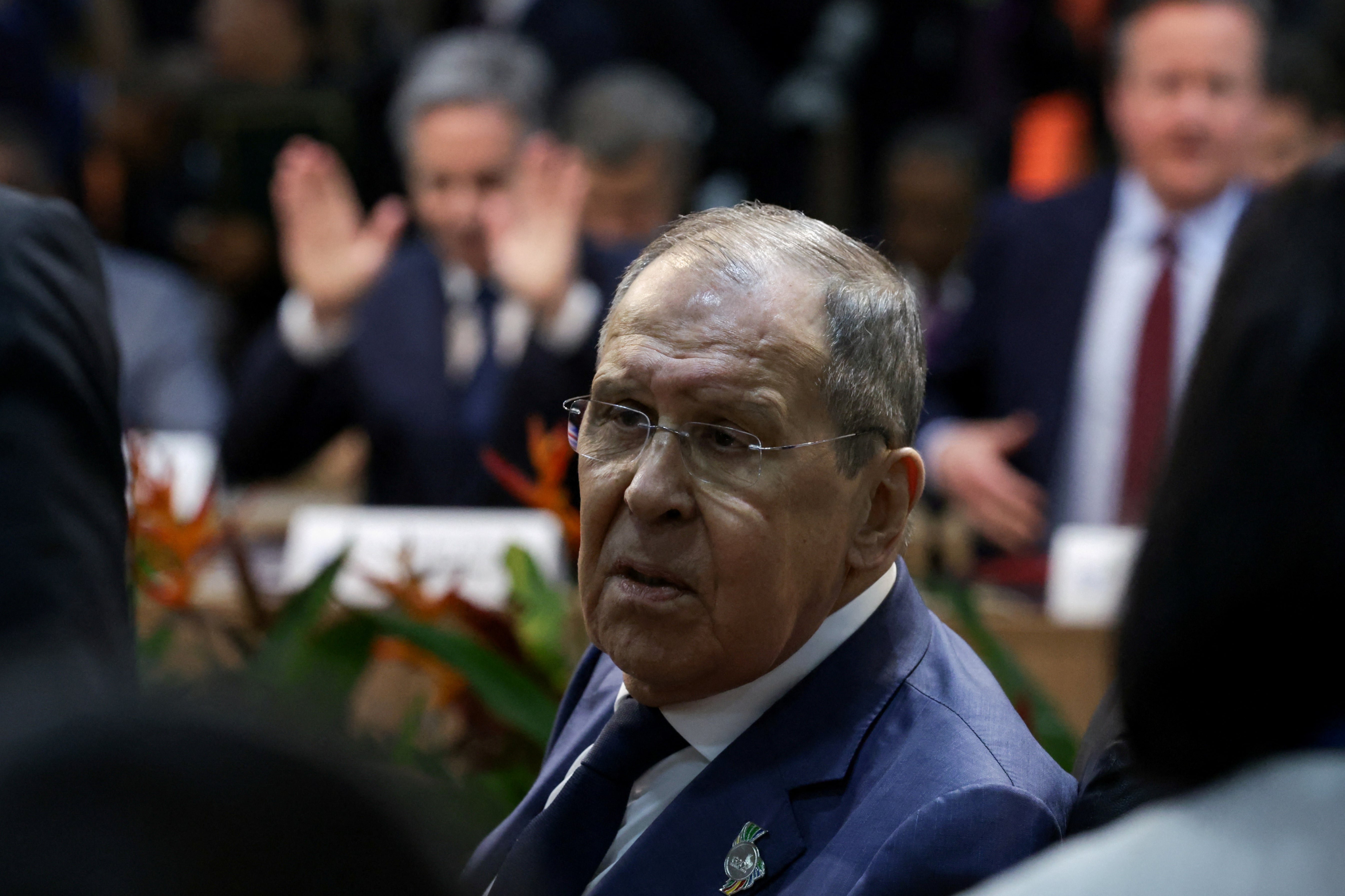 Russian foreign minister Sergei Lavrov, with David Cameron (right) and US secretary of state Antony Blinken in the background