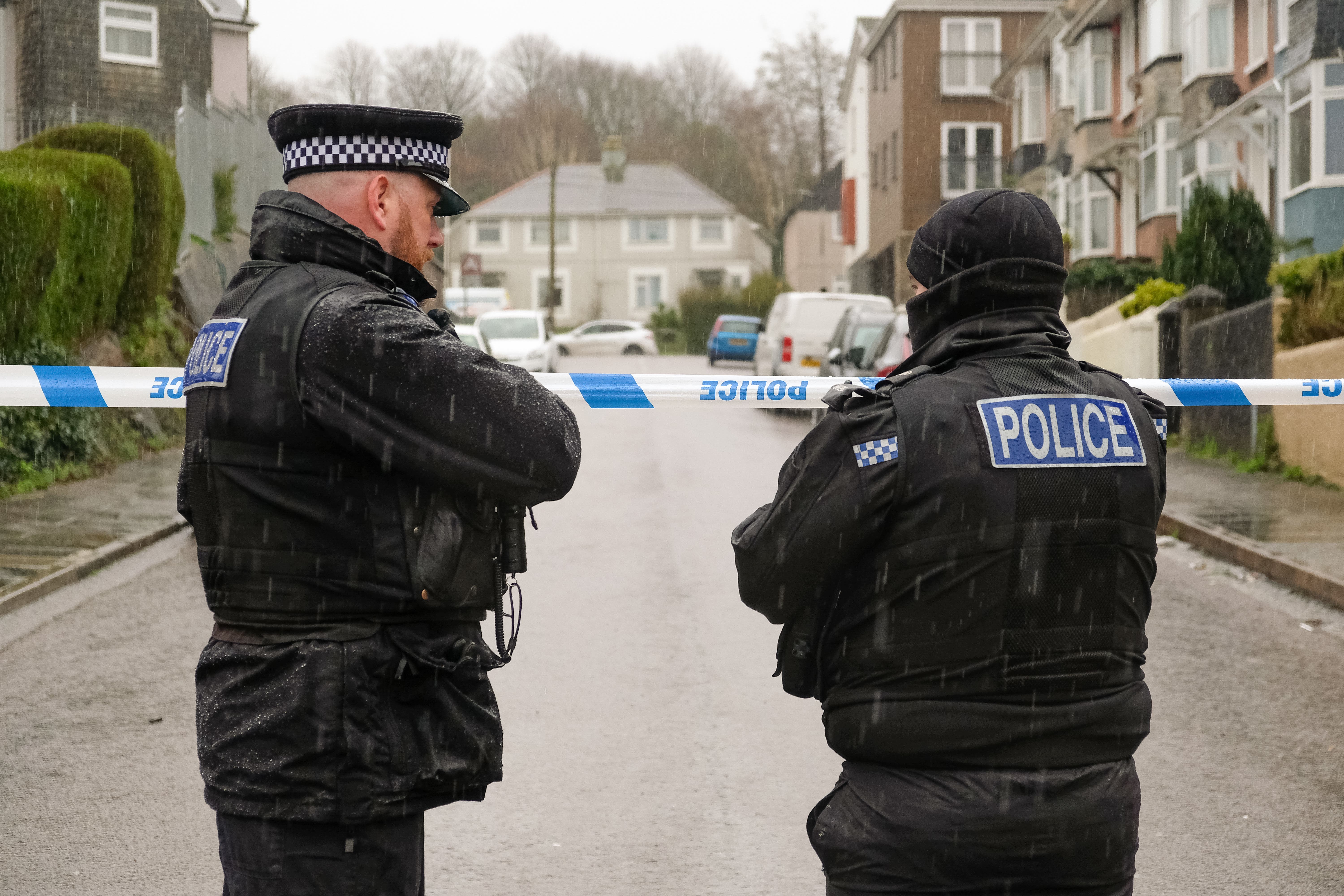 Emergency personnel by the cordon after a suspected Second World War explosive device was discovered in Plymouth (Matt Keeble/PA)