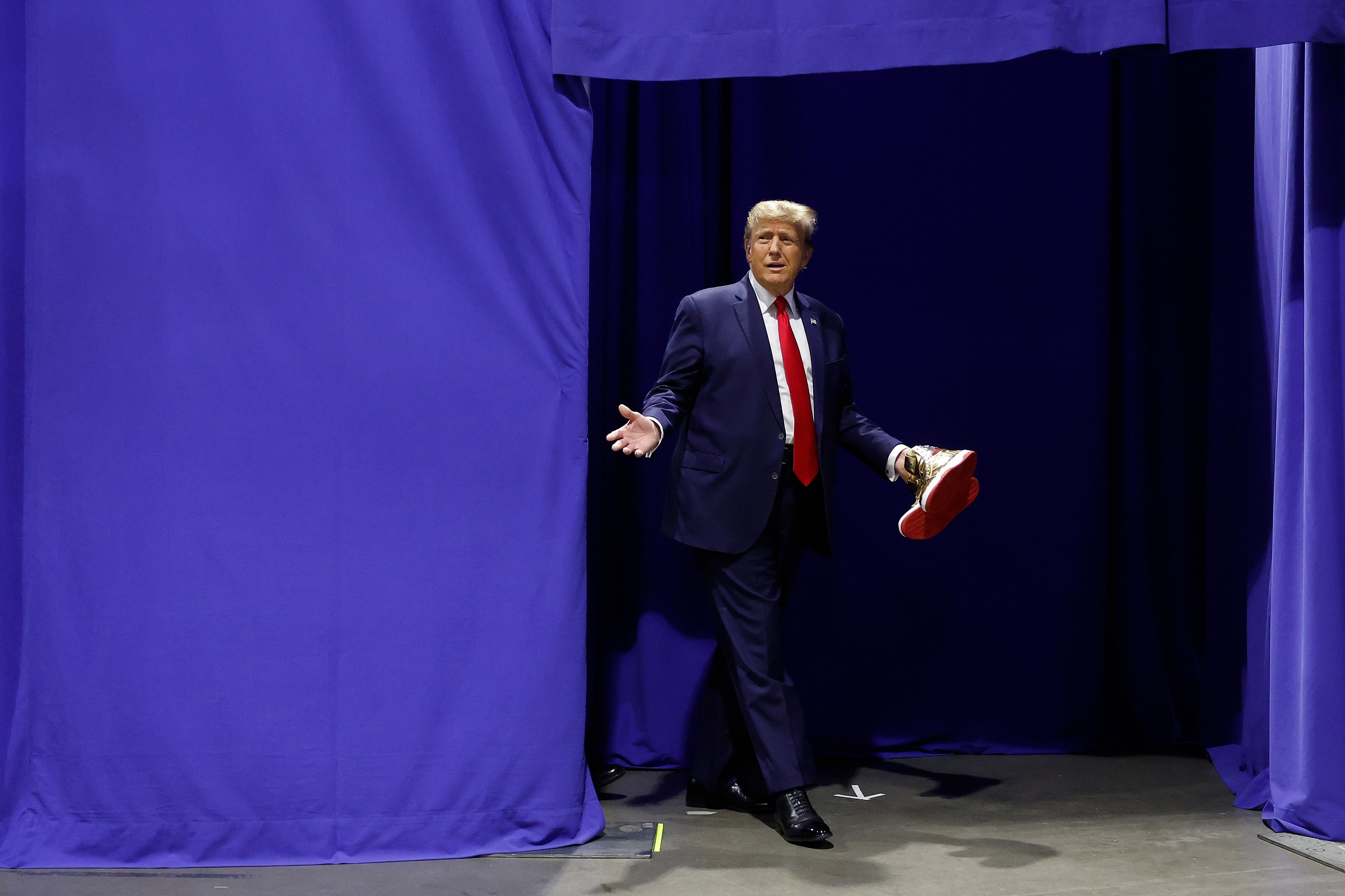 Donald Trump appears at a shoe conference in Philadelphia one day after losing a civil fraud trial finding him liable for more than $355m.