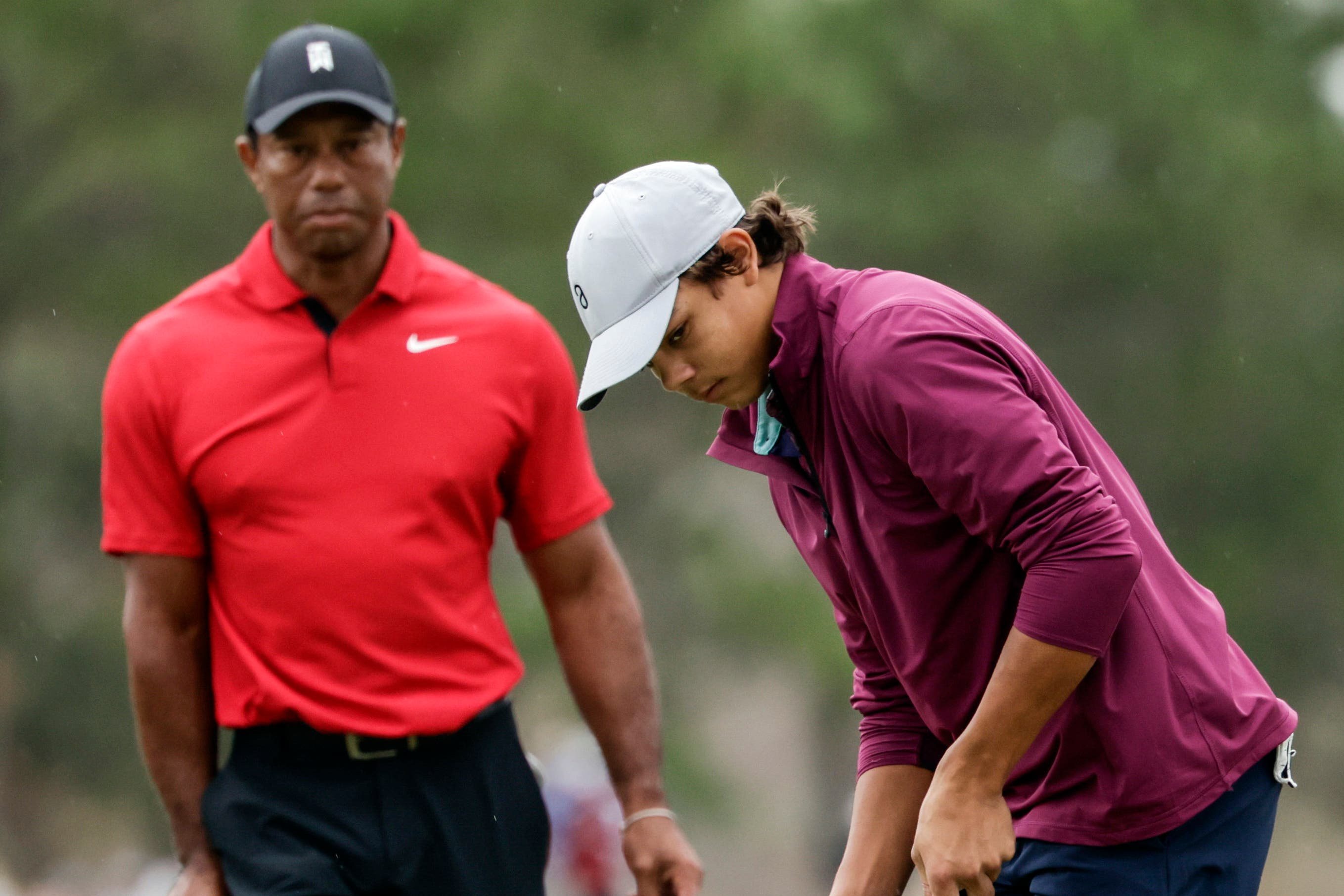 Tiger Woods’ son Charlie (right) was hoping to stay in contention to qualify for the PGA Tour event (Kevin Kolczynski/AP)