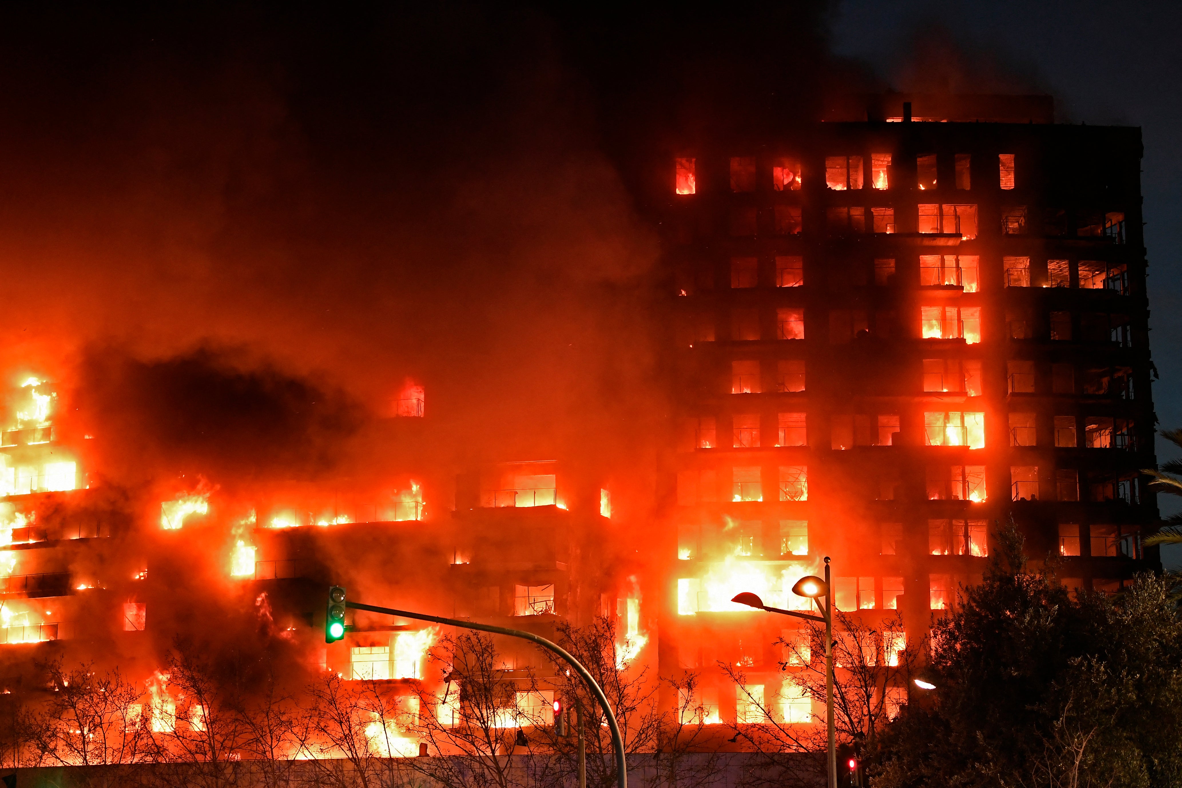 A huge fire rages through a multistorey residential block in Valencia