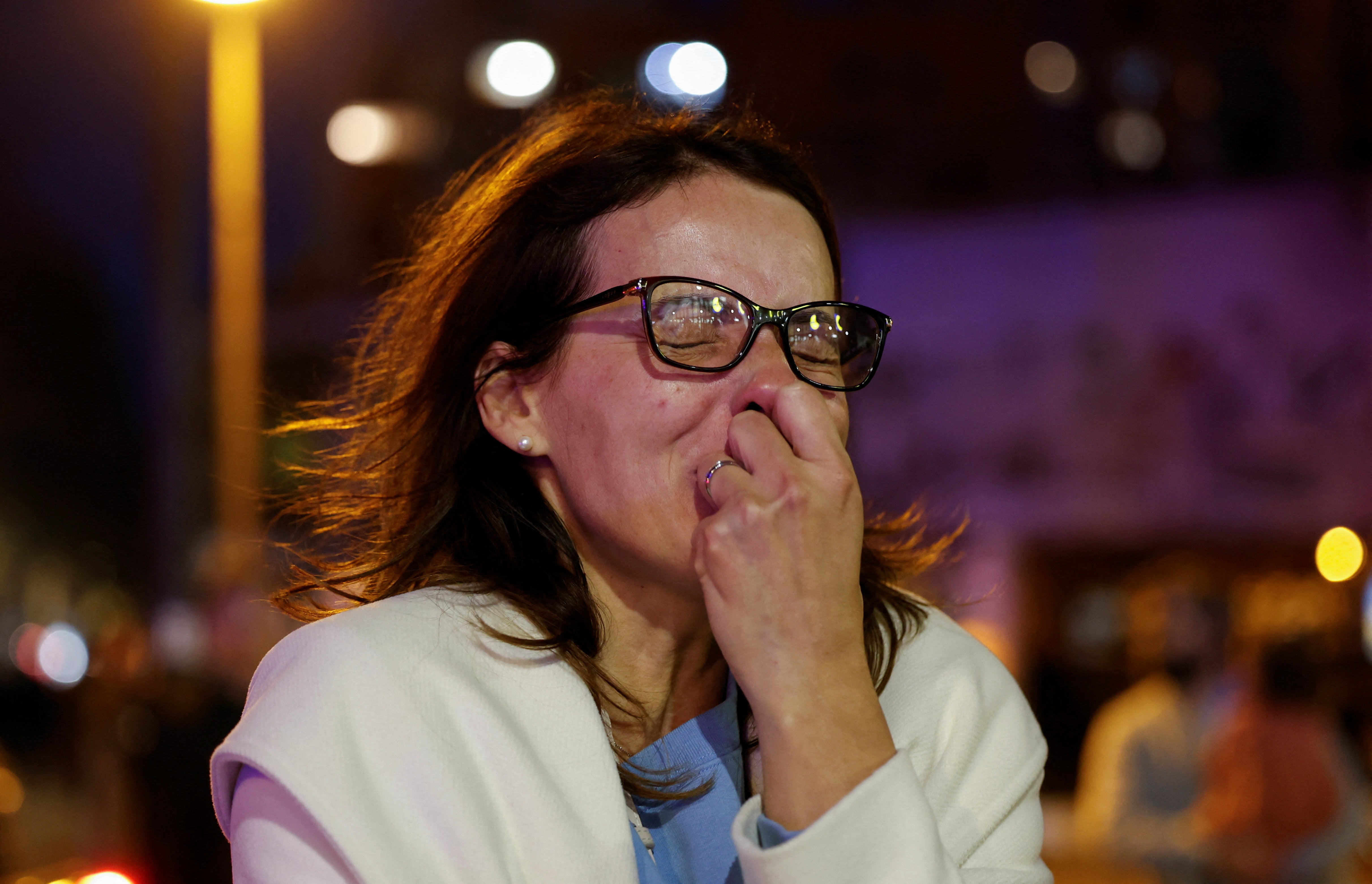 Building manager and resident Adriana reacts at the scene of the fire in Valencia