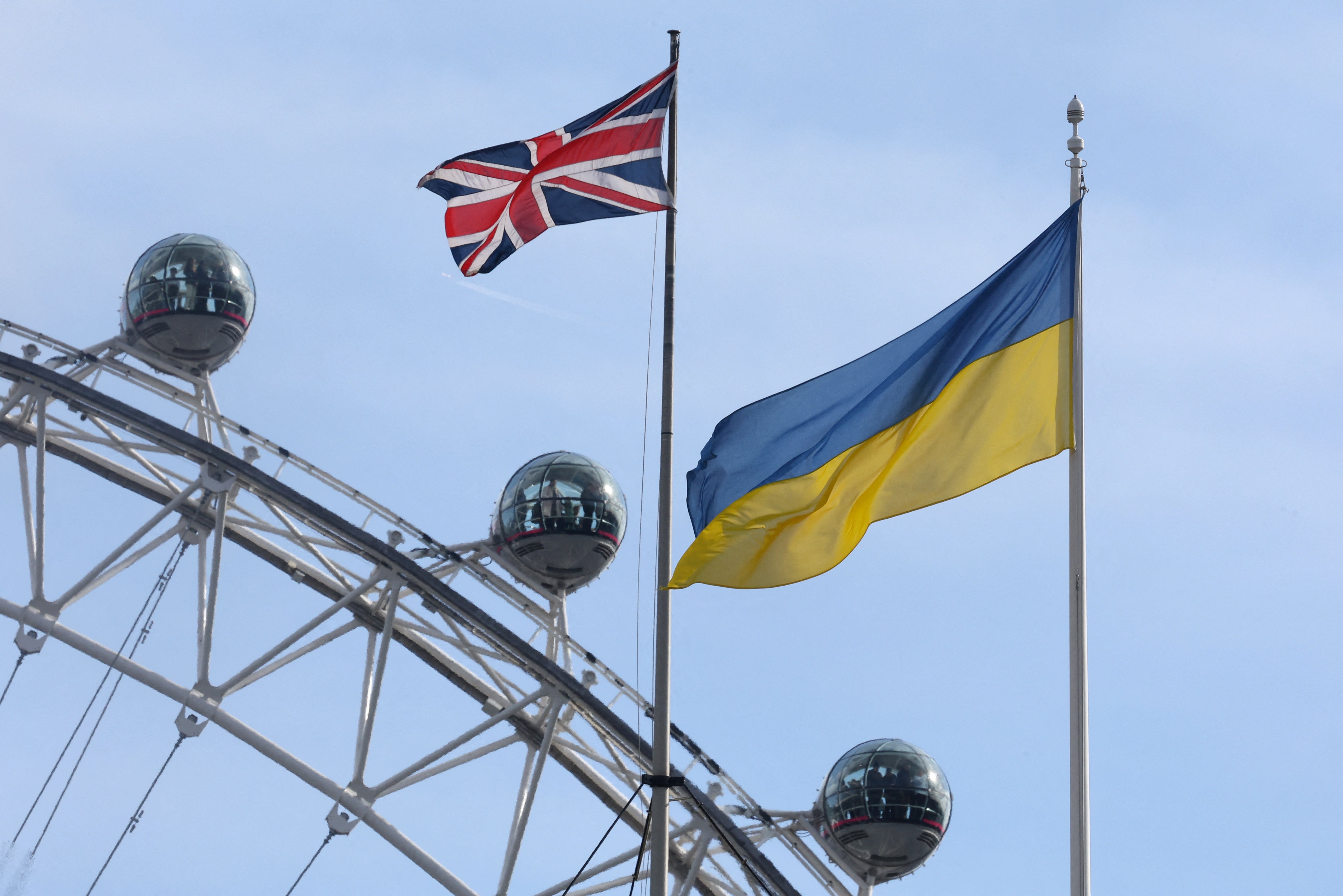 British and Ukraine flags fly side by side on many government buildings