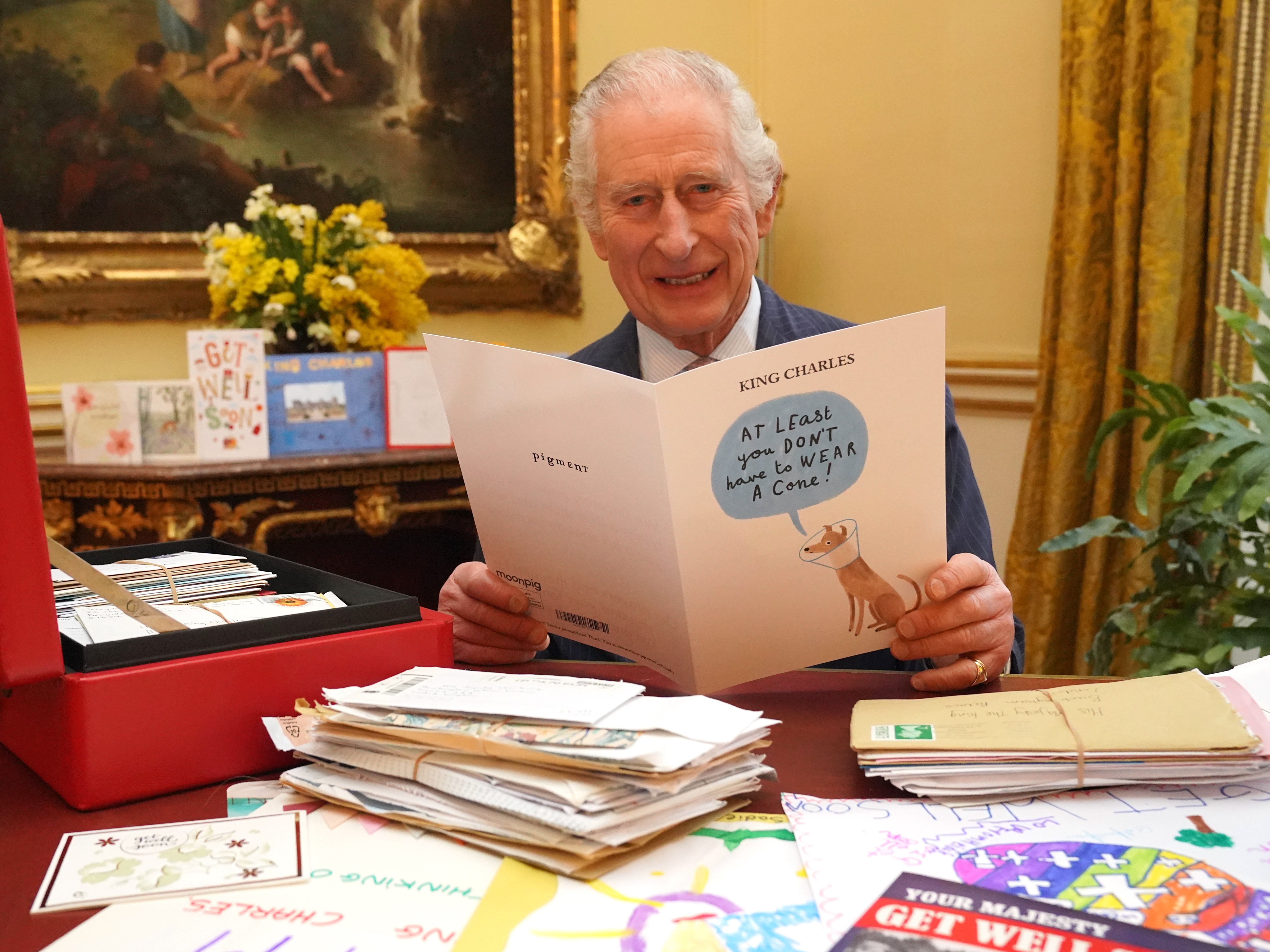 King Charles reads cards and messages sent by well-wishers