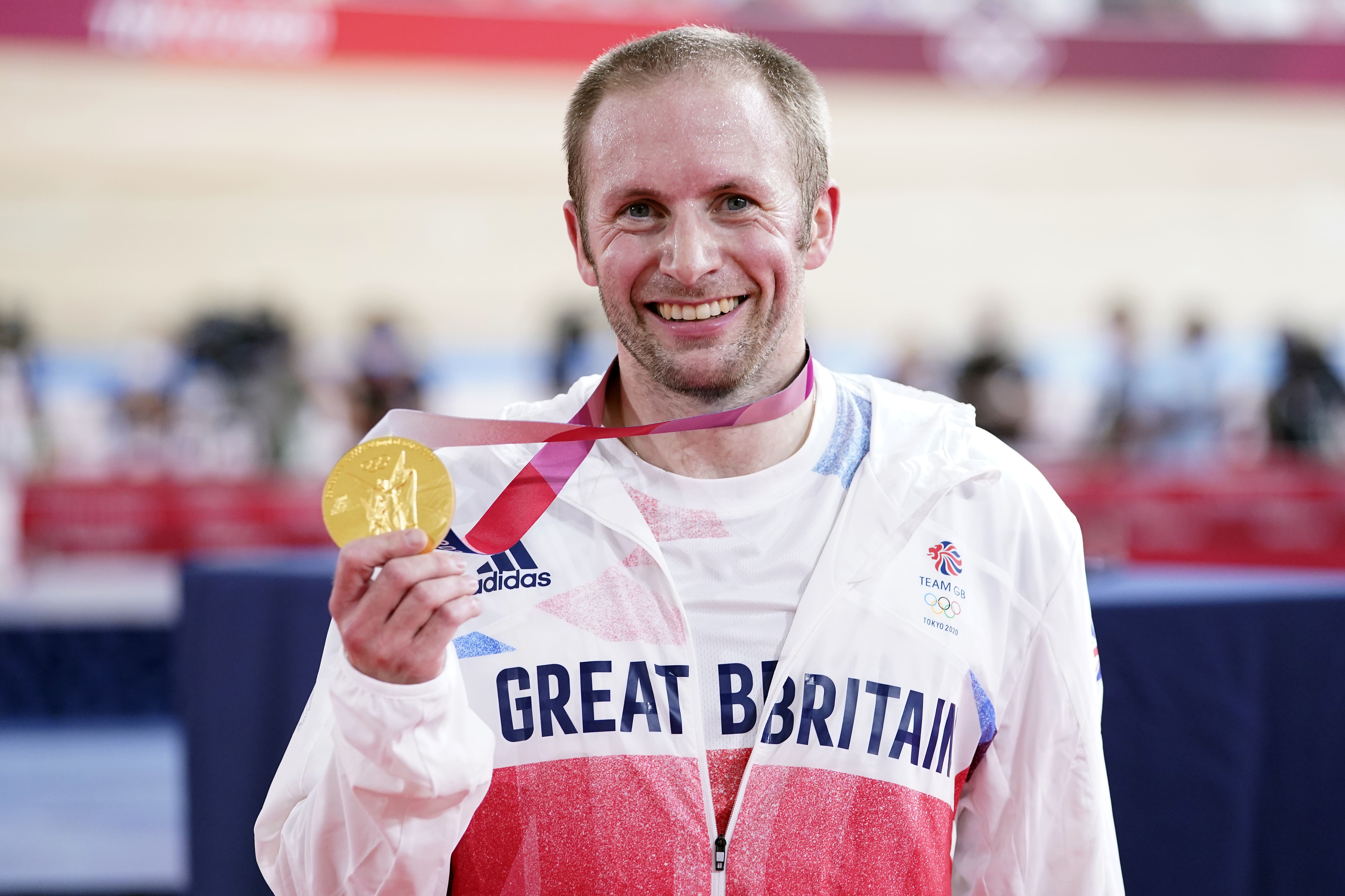 Great Britain’s Sir Jason Kenny celebrates with the gold medal he won in the men’s keirin in Tokyo (Danny Lawson/PA)