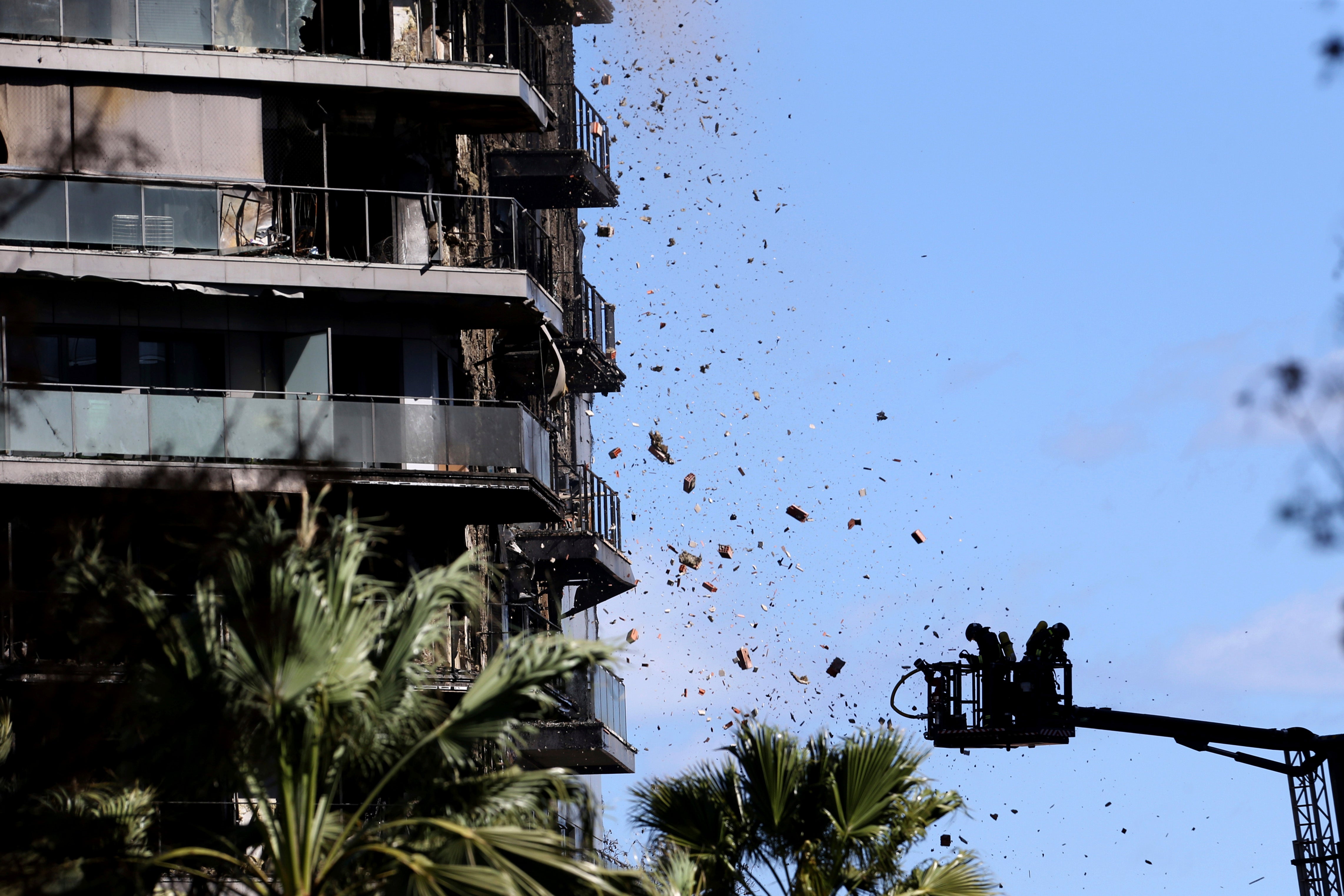 Debris flew out at firefighters who worked to put out the blaze