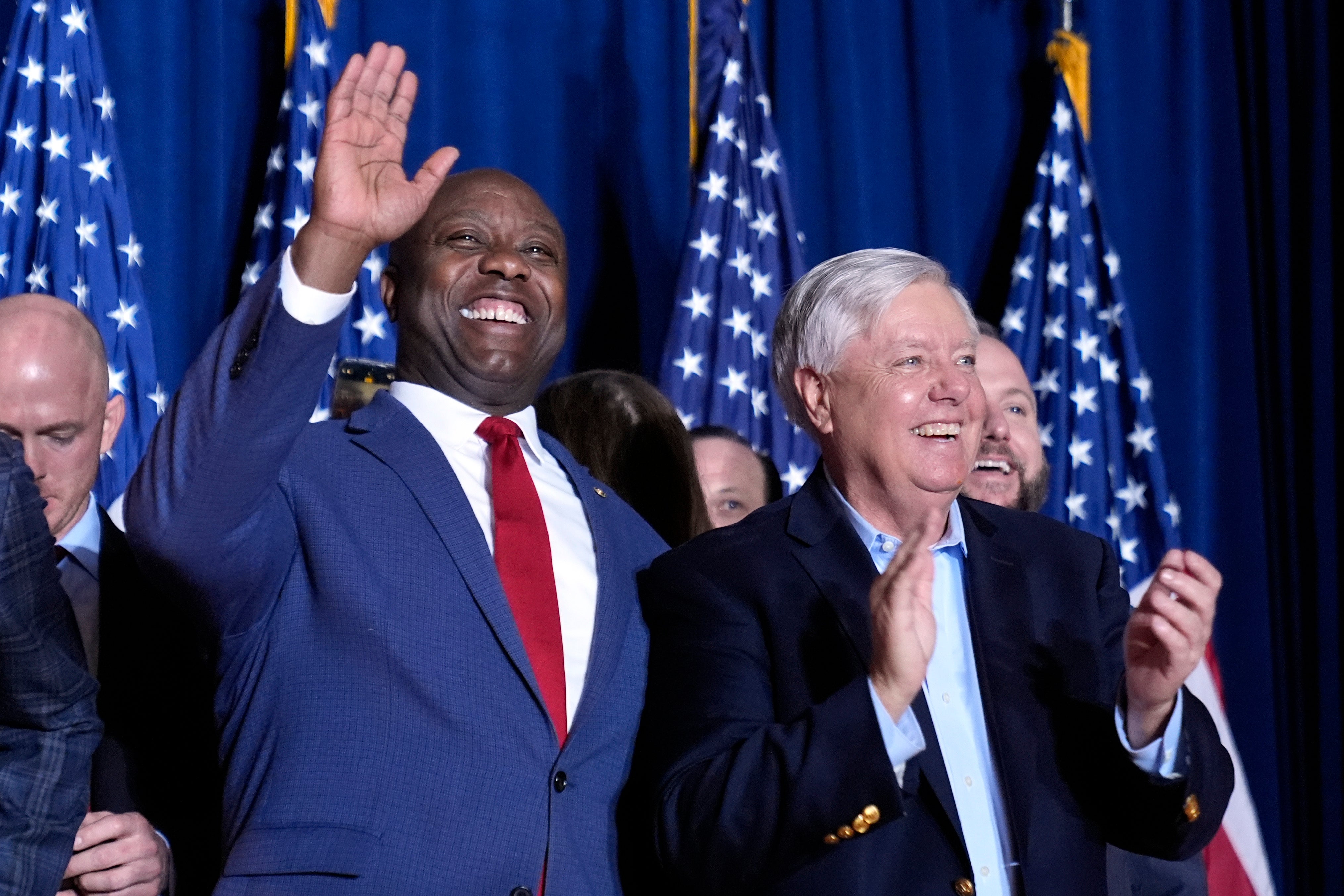 Graham stumping for Trump with fellow Republican Senator Tim Scott in South Carolina in February 2024