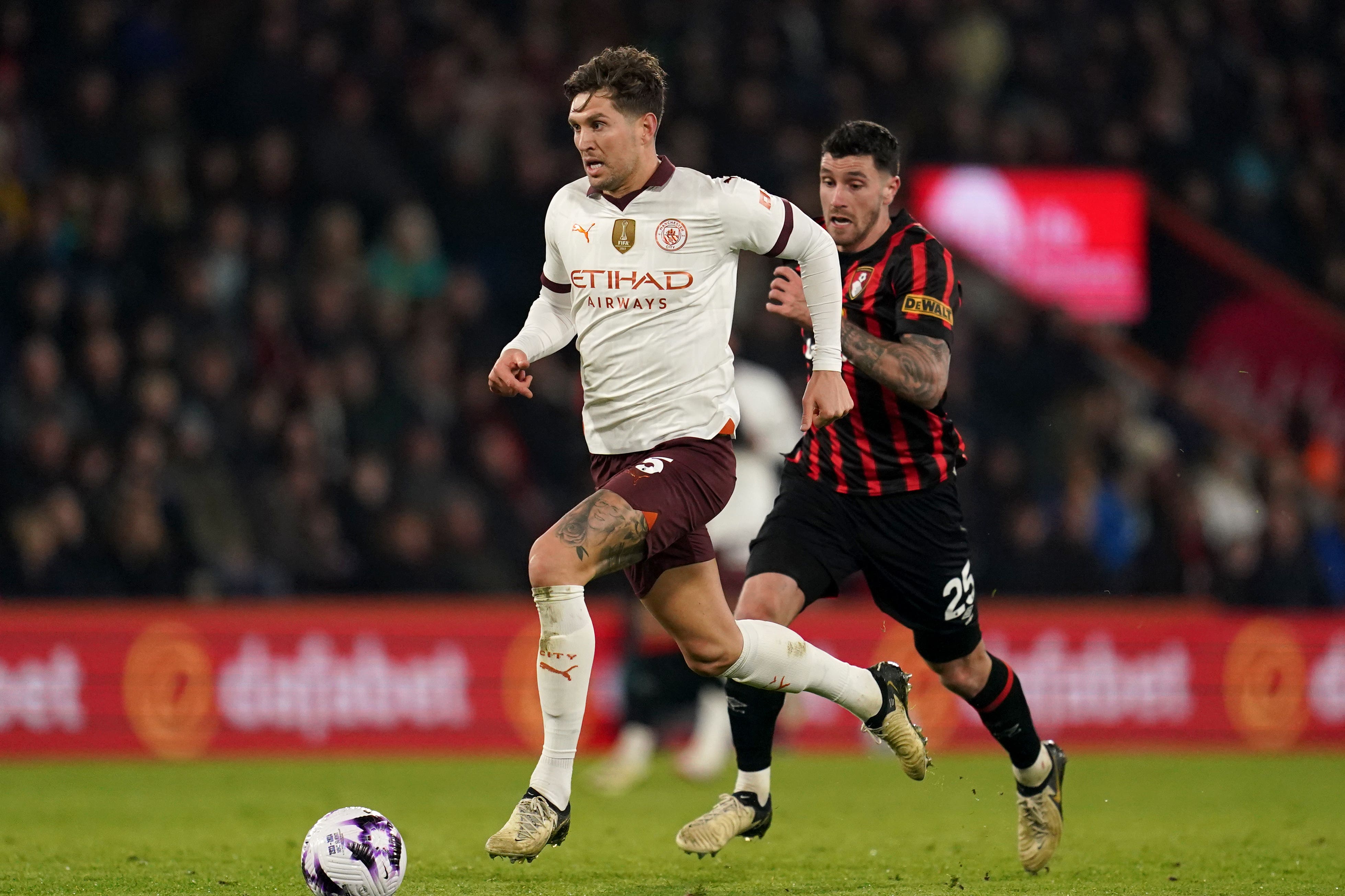 John Stones helped Manchester City secure a 15th win from their last 17 matches with a 1-0 victory at Bournemouth (Adam Davy/PA)