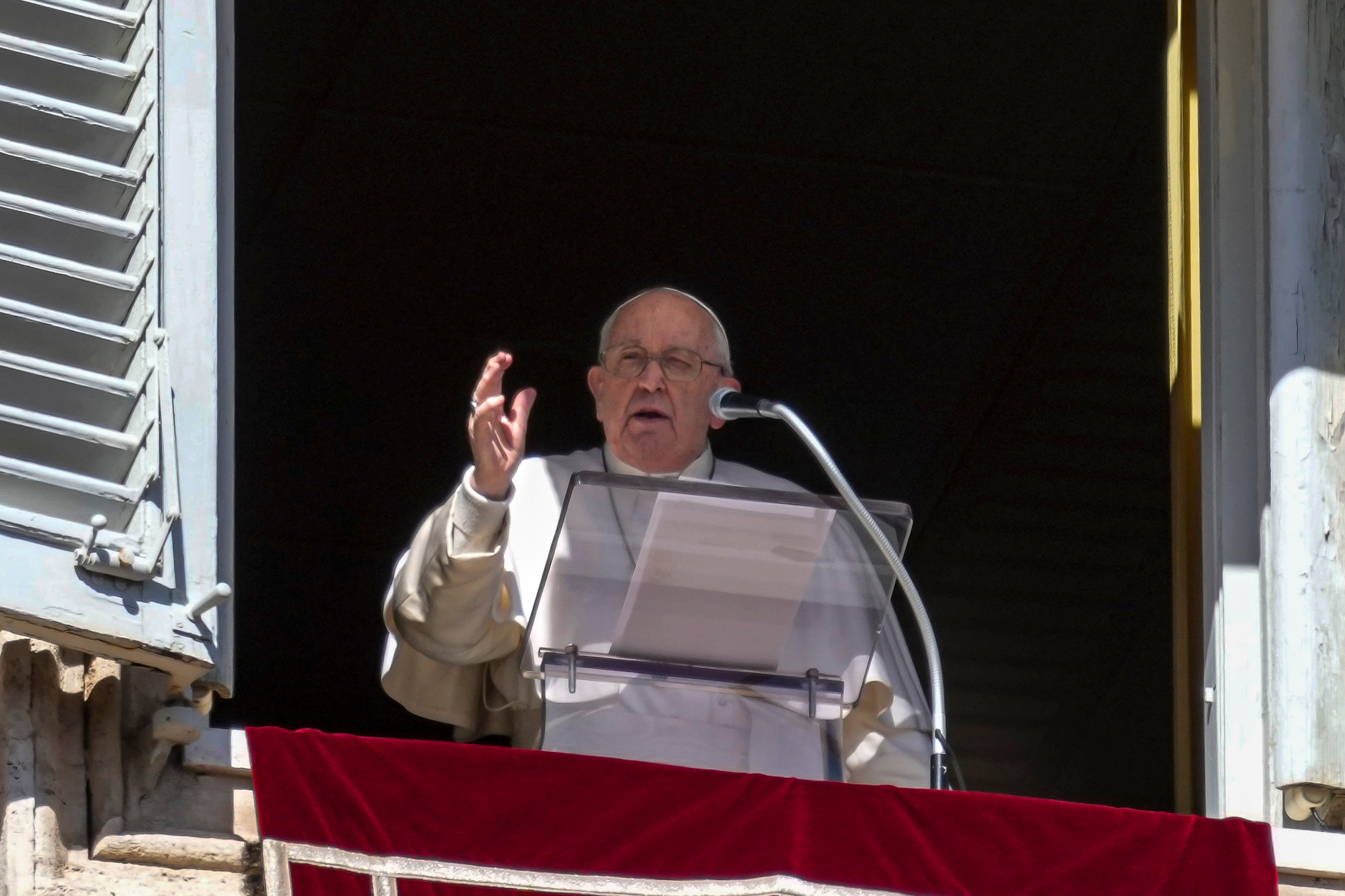 Pope Francis appears at the window of his studio overlooking St. Peter’s Square at The Vatican