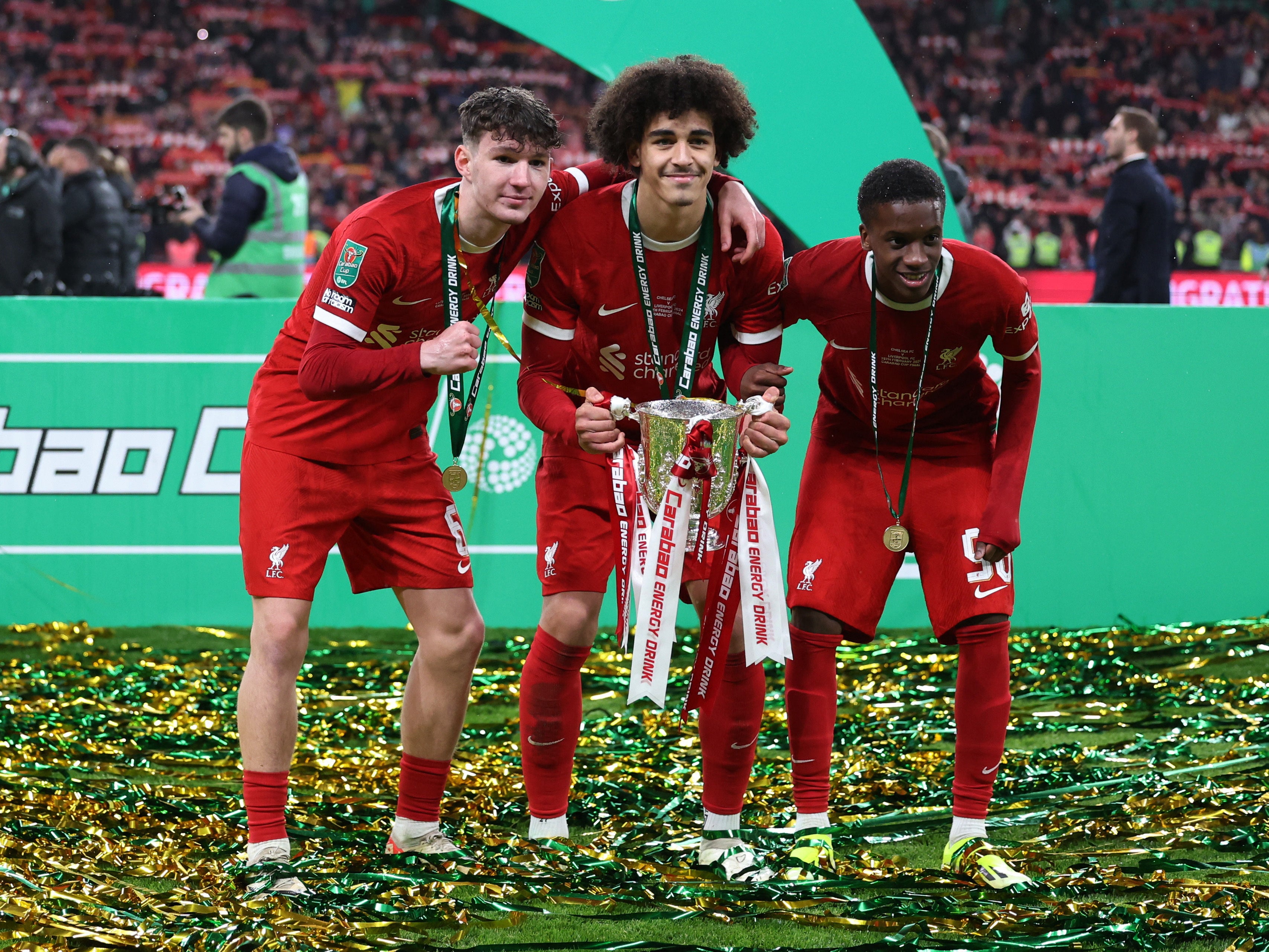 Liverpool's Lewis Koumas, Jayden Danns and Trey Nyoni celebrate winning the Carabao Cup