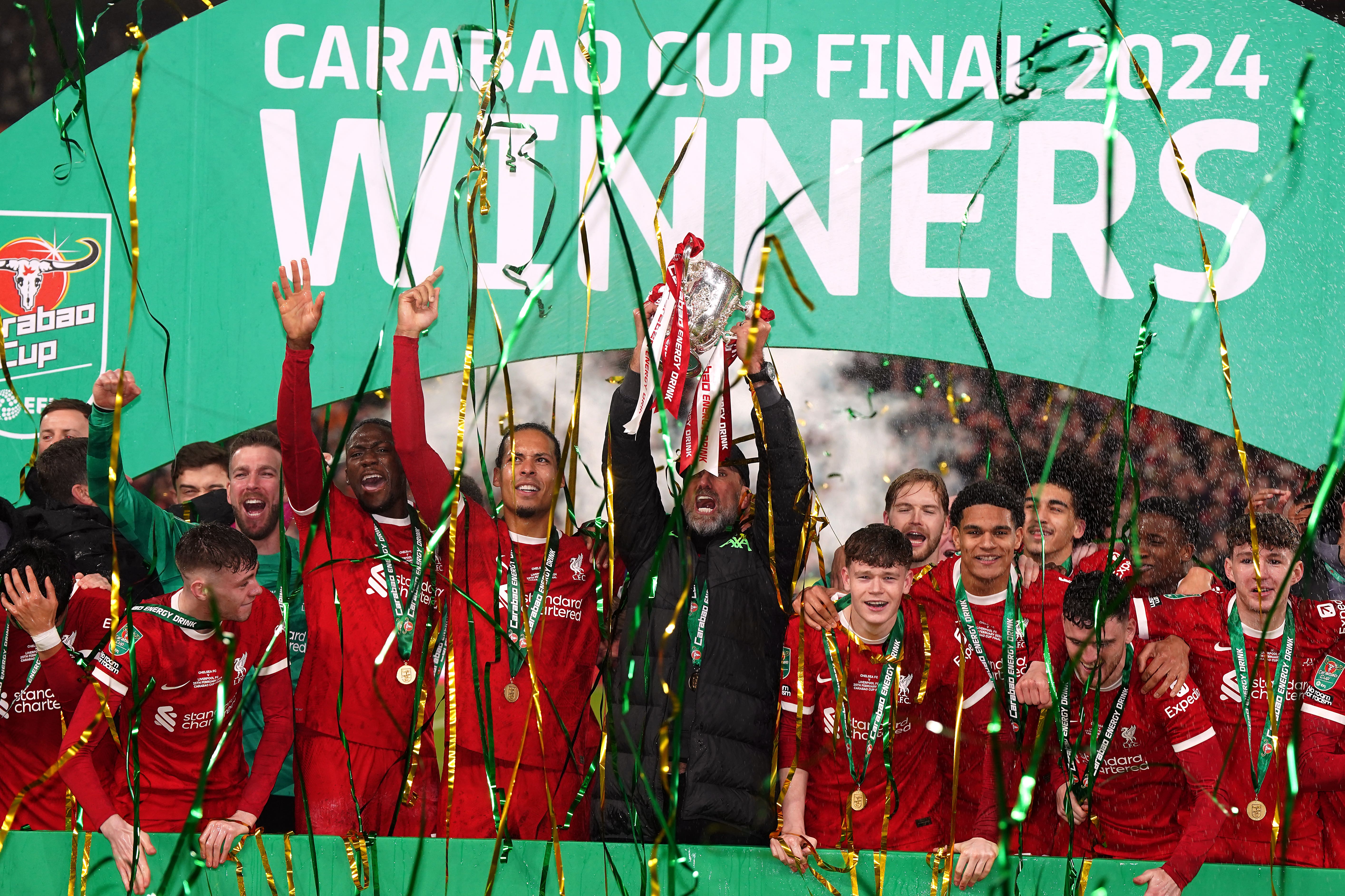 Liverpool manager Jurgen Klopp lifts the trophy after guiding his side to Carabao Cup final victory at Wembley (Nick Potts/PA)