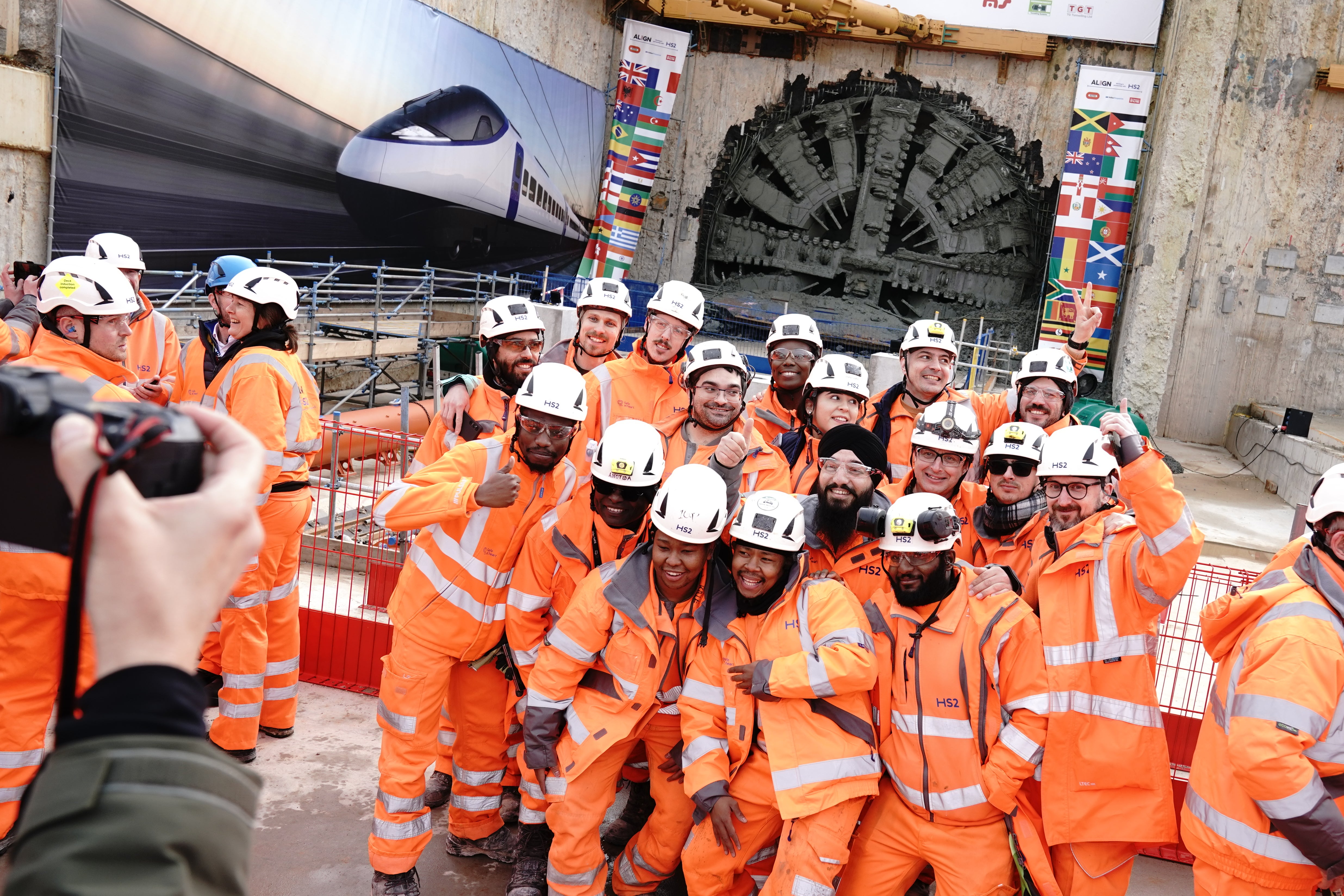 Workers pose for photos after digging machine Florence completed HS2’s longest tunnel