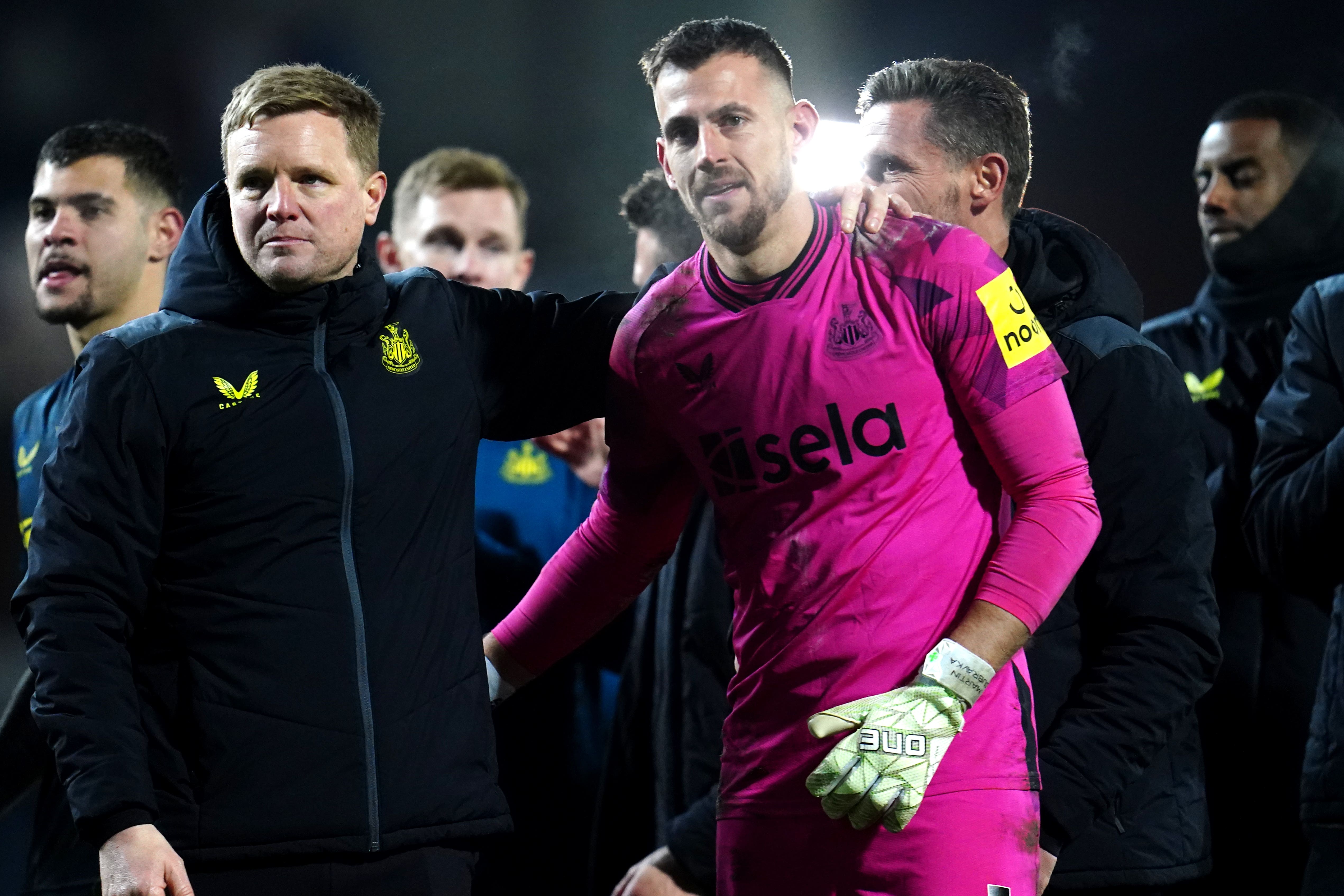 Eddie Howe congratulates goalkeeper Martin Dubravka after Newcastle’s penalty shoot-out win (Nick Potts/PA)