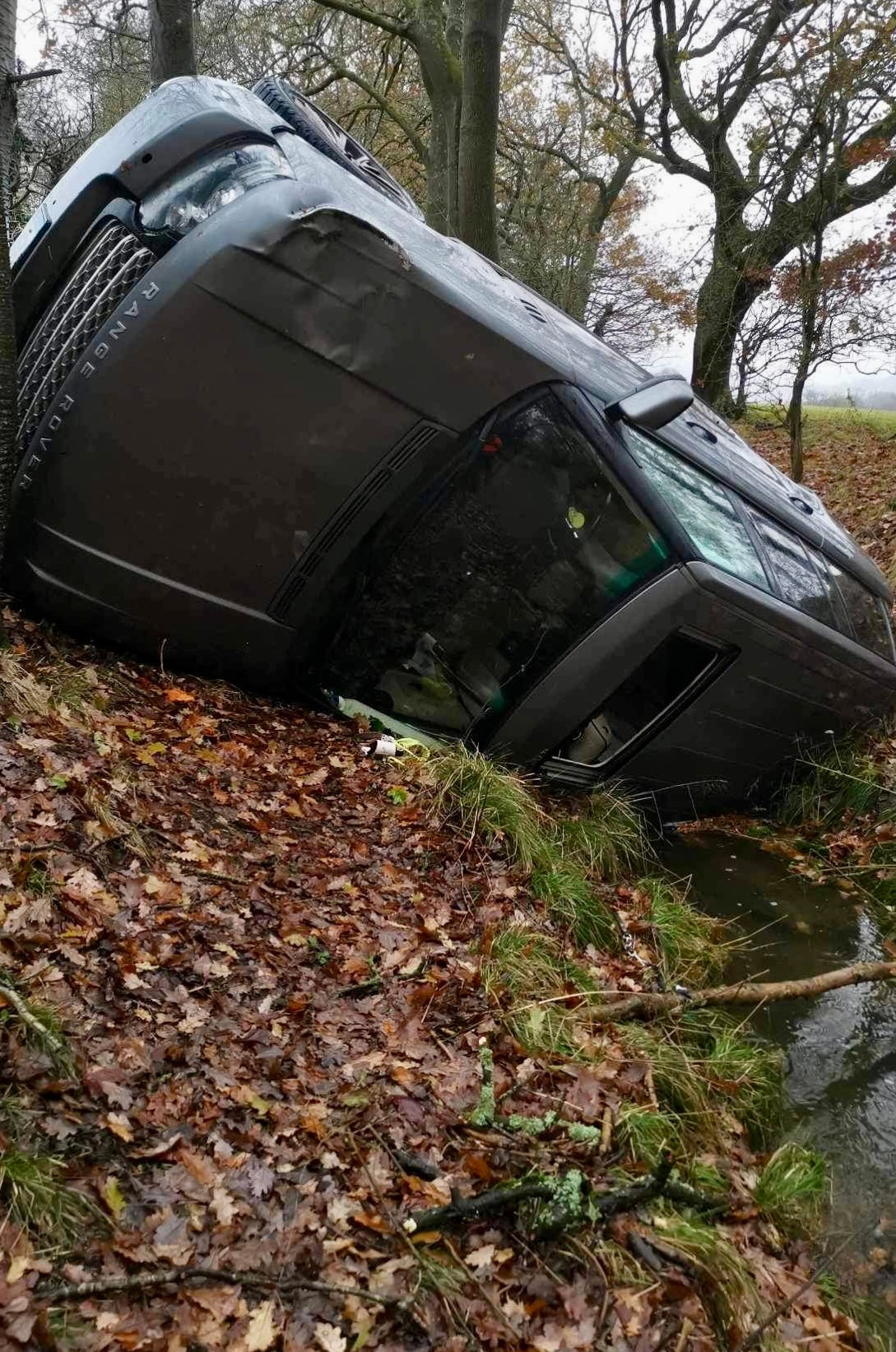 Martin and John's car after it fell from the road (Collect/PA Real Life)